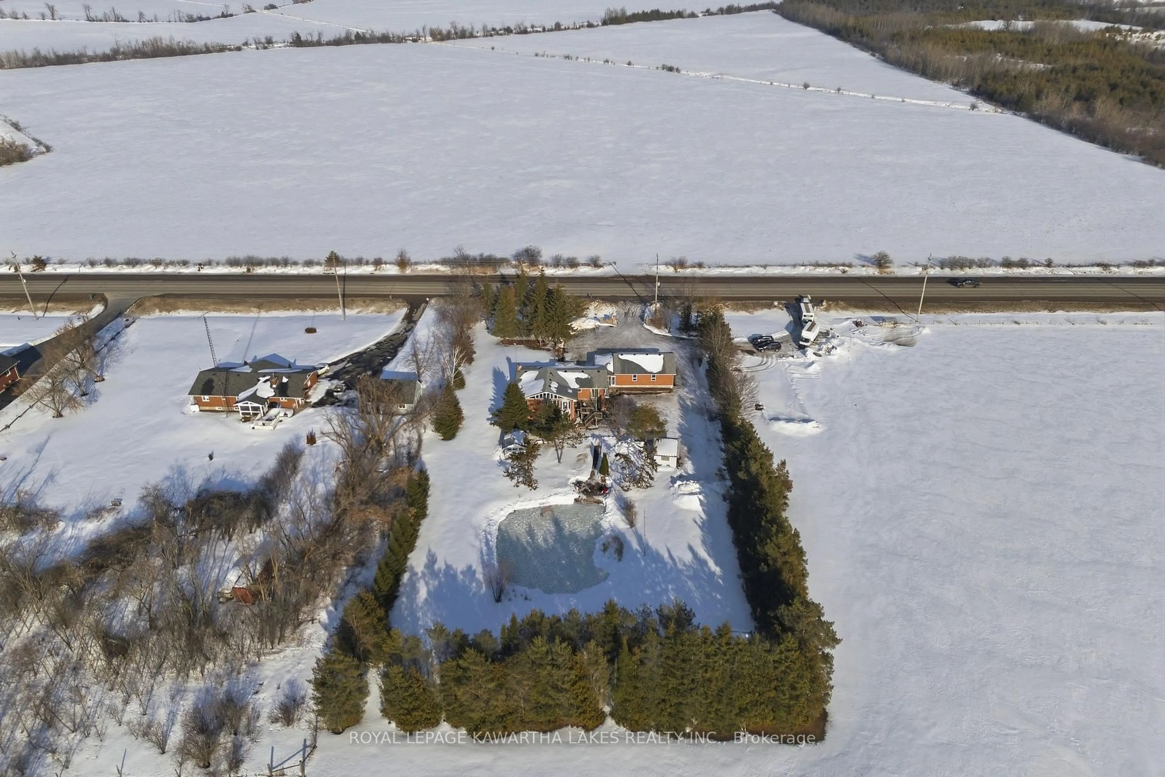A pic from outside/outdoor area/front of a property/back of a property/a pic from drone, street for 77 County Rd 36, Kawartha Lakes Ontario K9V 4R4