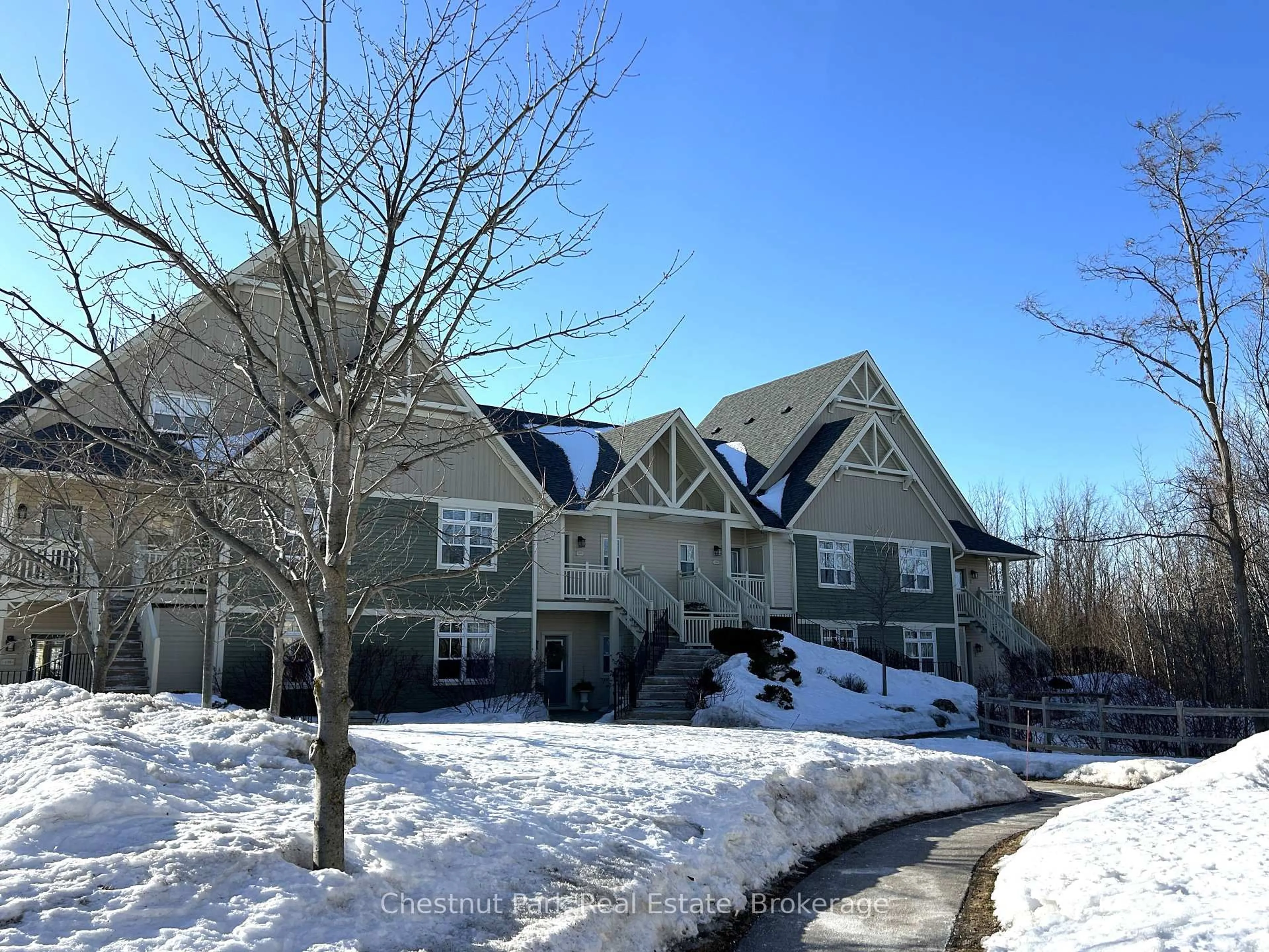 A pic from outside/outdoor area/front of a property/back of a property/a pic from drone, street for 130 Fairway Crt #135, Blue Mountains Ontario L9Y 0P8