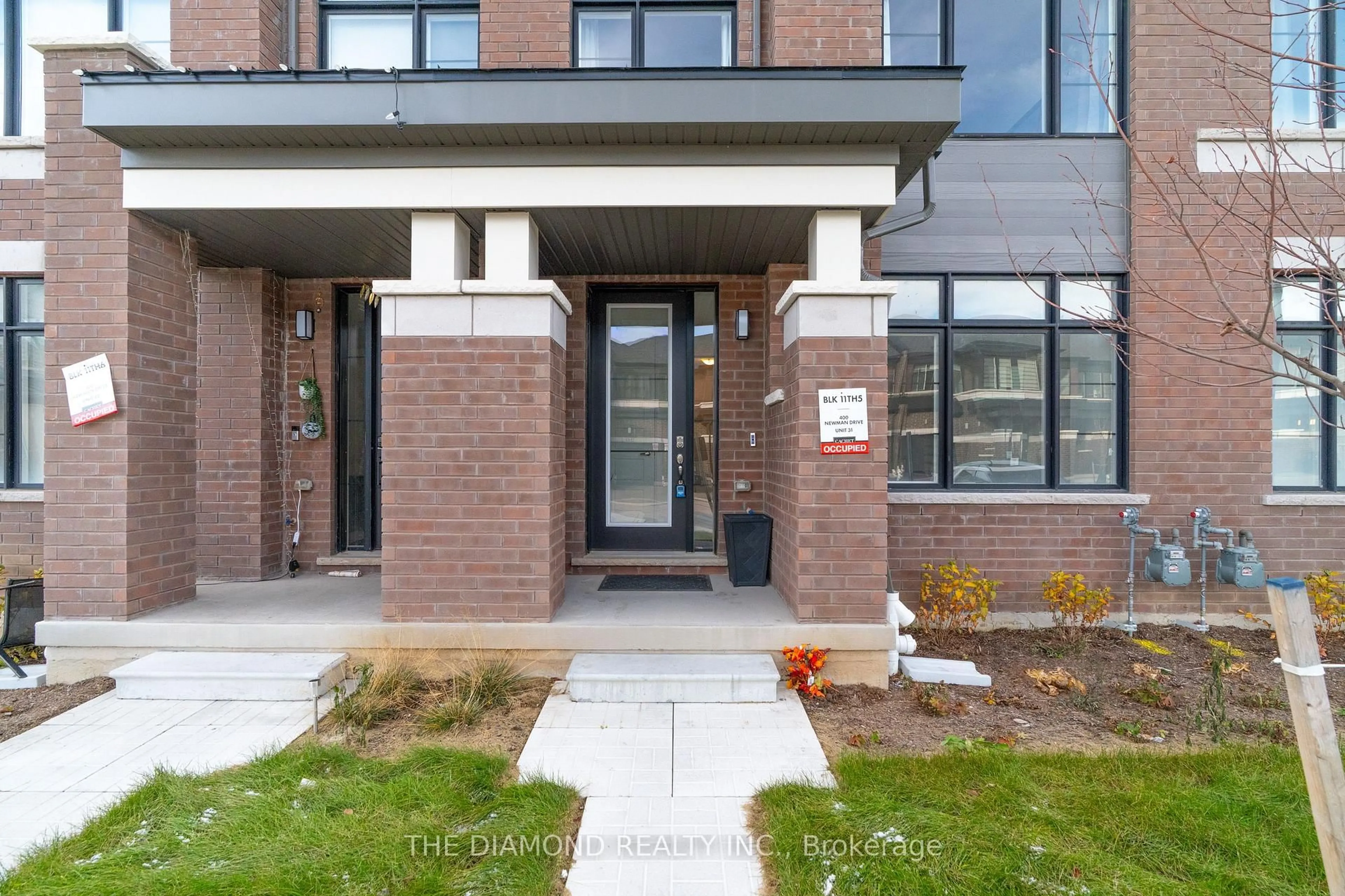 Home with brick exterior material, street for 400 Newman Dr #31, Cambridge Ontario N1S 0E8