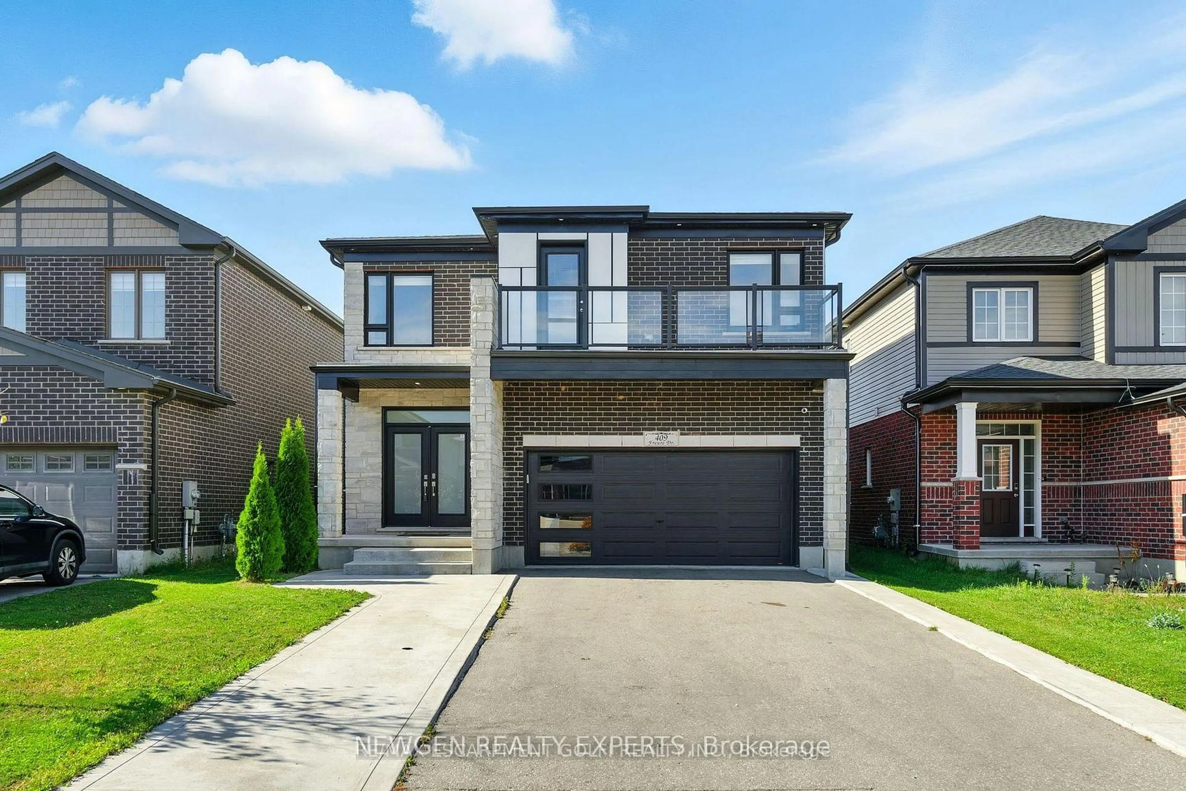 Home with brick exterior material, street for 409 Freure Dr, Cambridge Ontario N1S 0A2