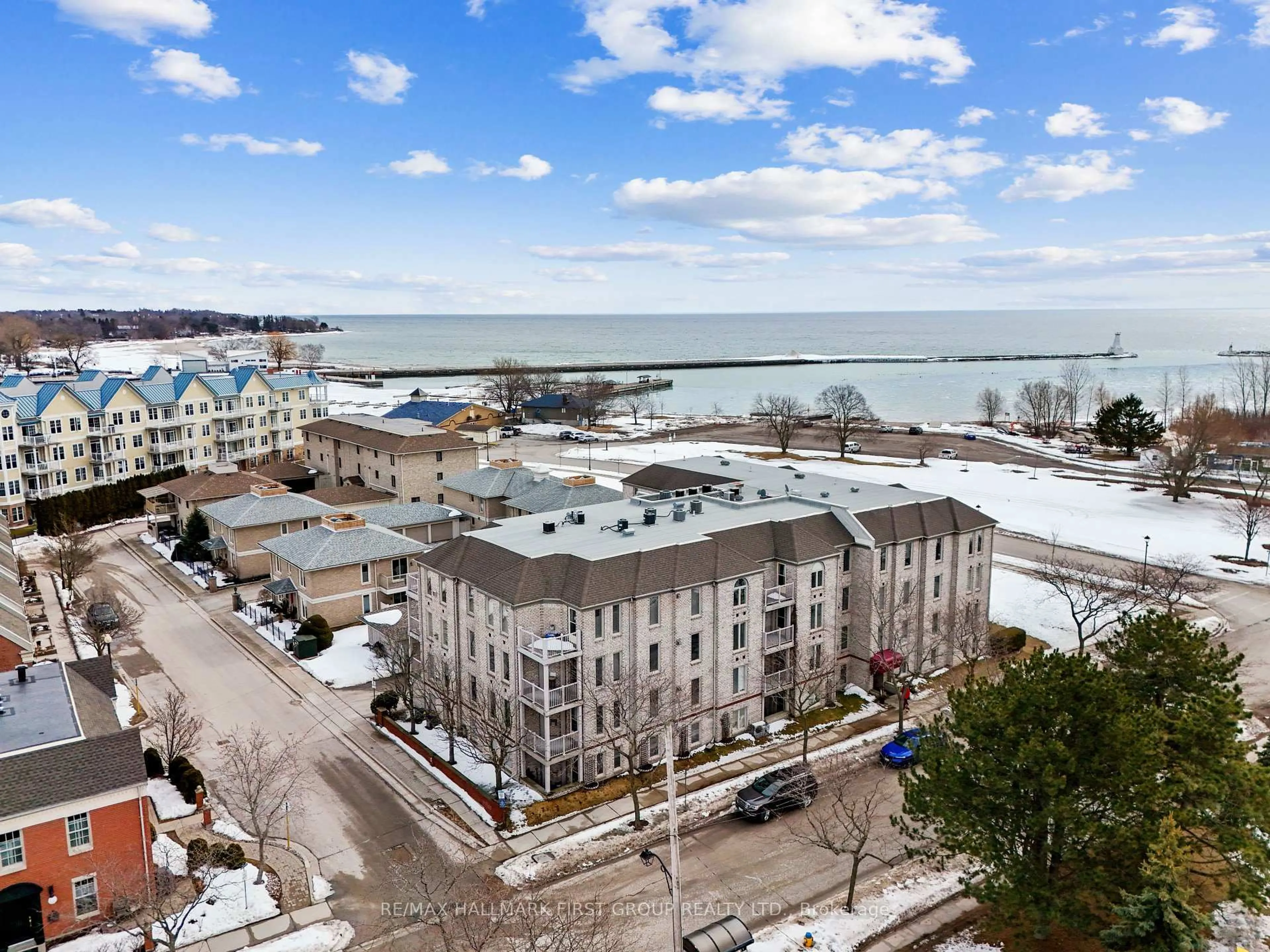 A pic from outside/outdoor area/front of a property/back of a property/a pic from drone, water/lake/river/ocean view for 107 Marisa Lane #306, Cobourg Ontario K9A 5N6