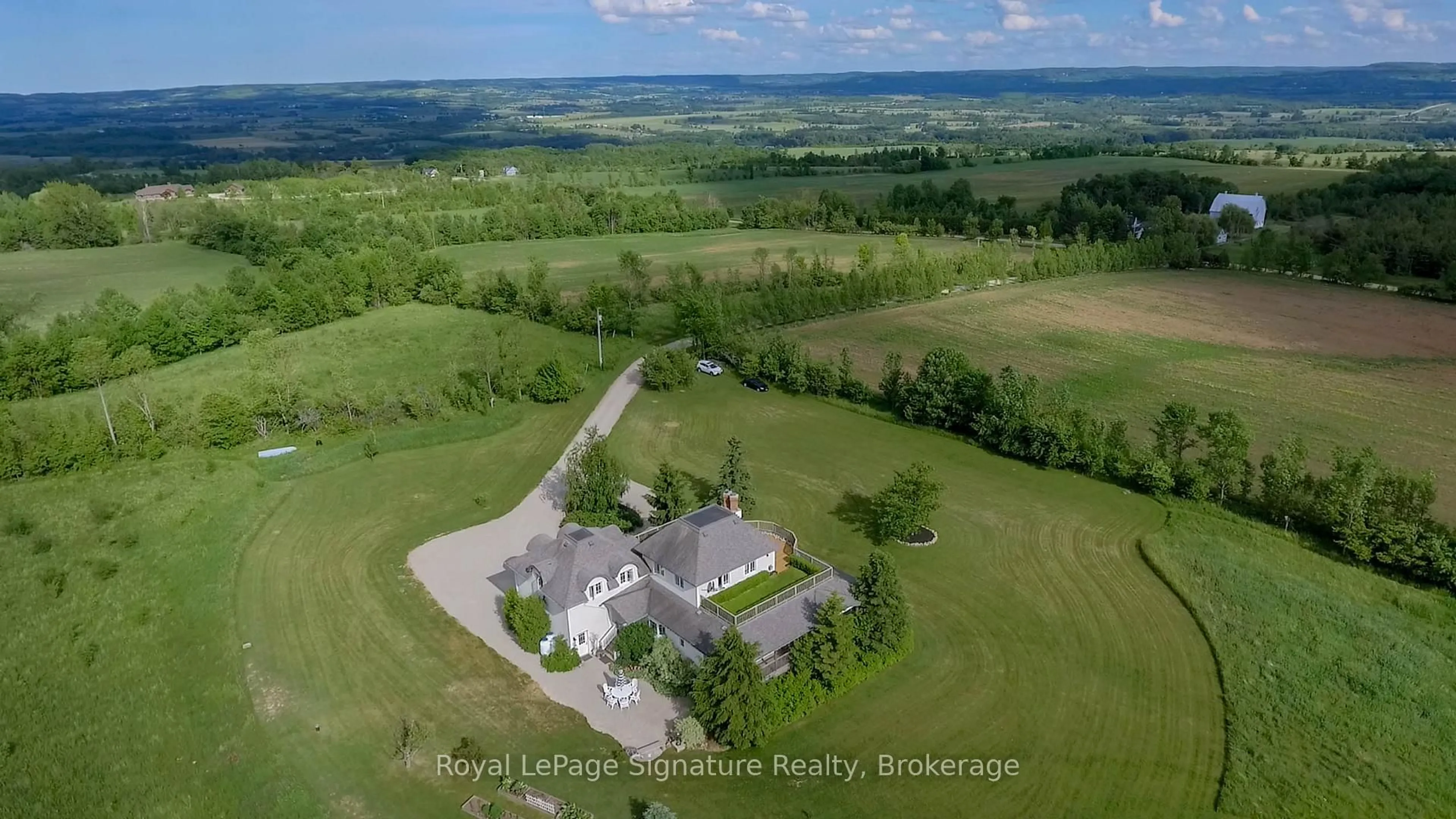 A pic from outside/outdoor area/front of a property/back of a property/a pic from drone, unknown for 807035 25th Side Rd, Grey Highlands Ontario N0C 1G0