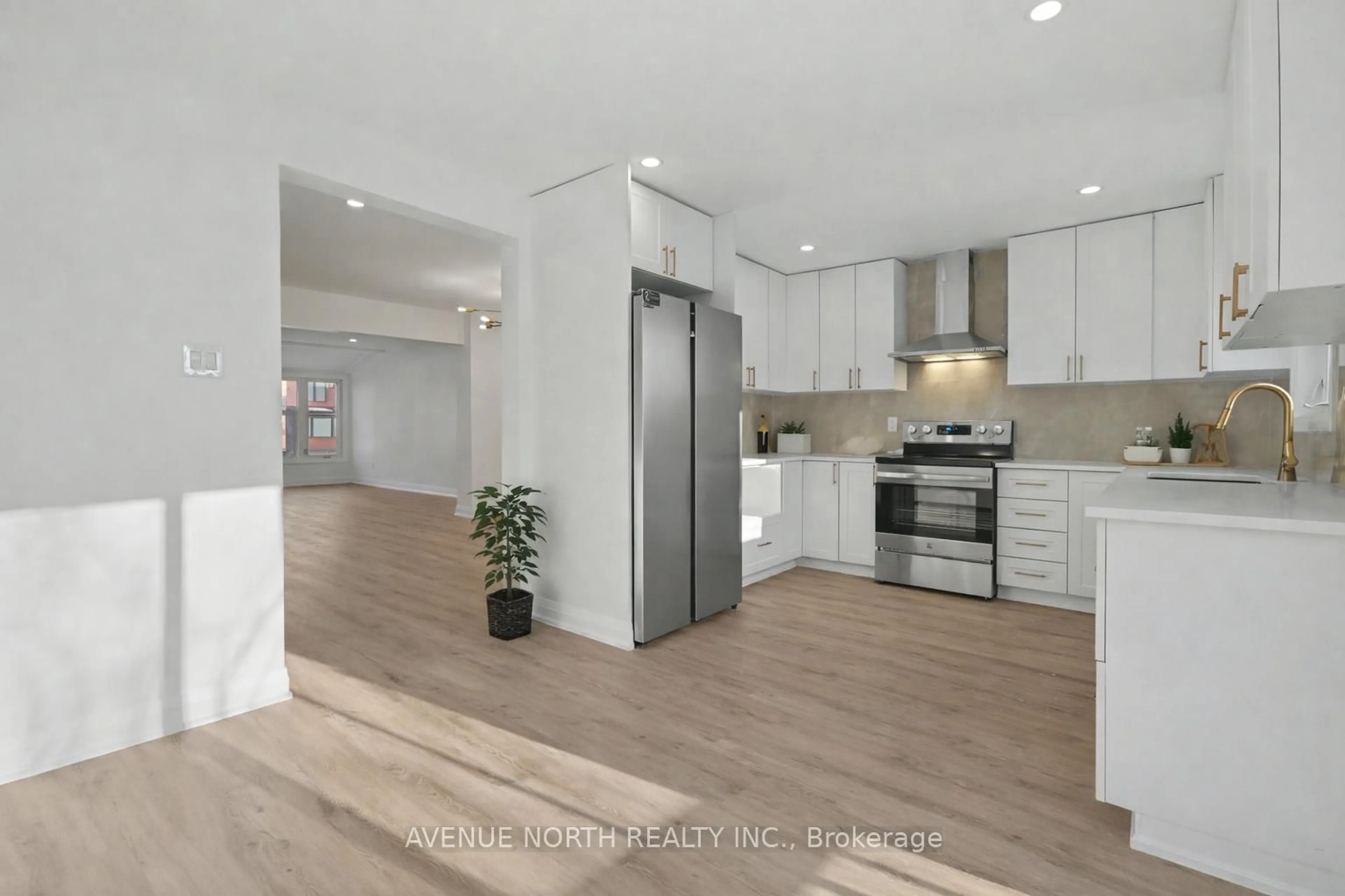 Open concept kitchen, wood/laminate floor for 4 Marielle Crt, Ottawa Ontario K2B 8P4