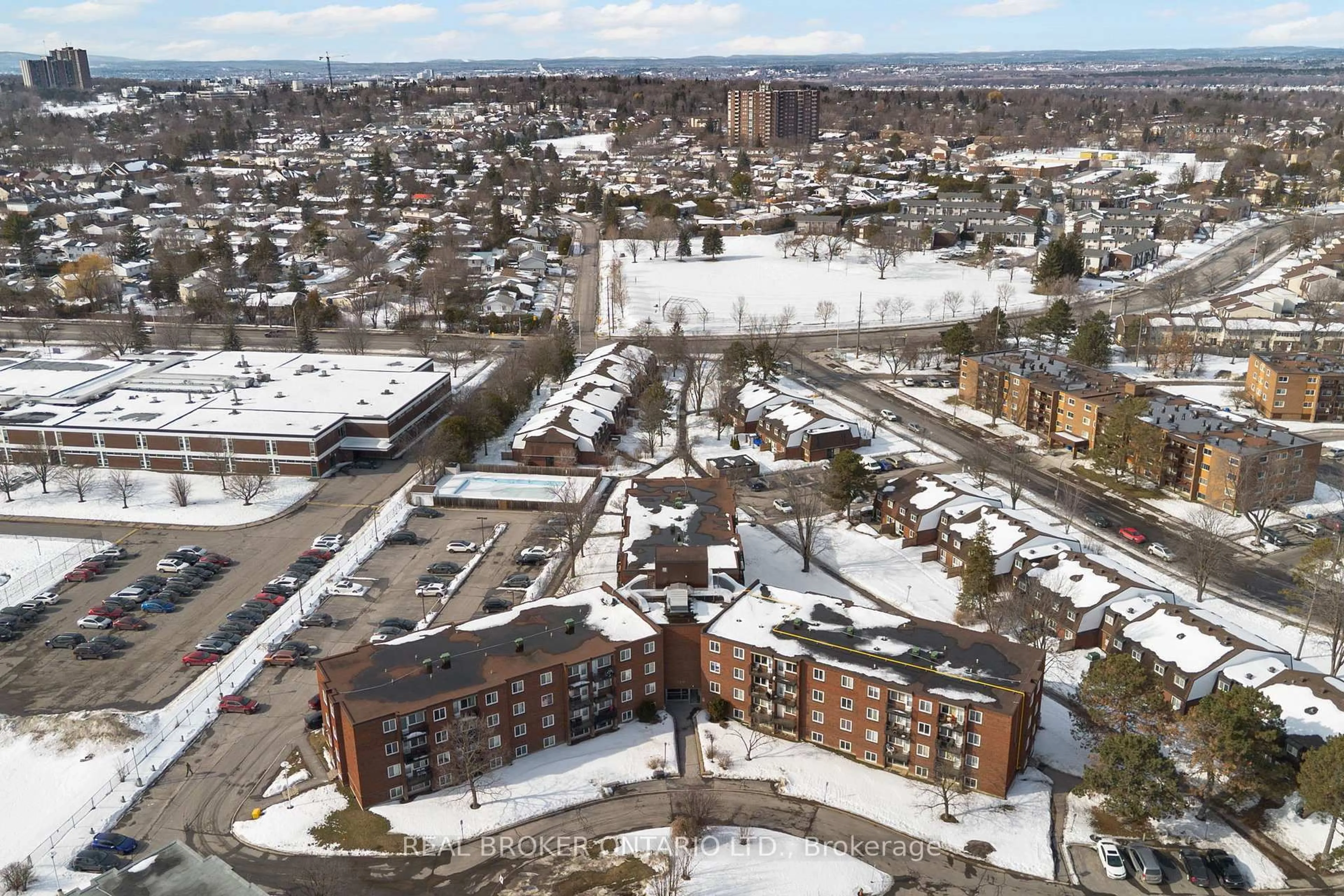 A pic from outside/outdoor area/front of a property/back of a property/a pic from drone, unknown for 2041 Arrowsmith Dr #103C, Ottawa Ontario K1J 7V7