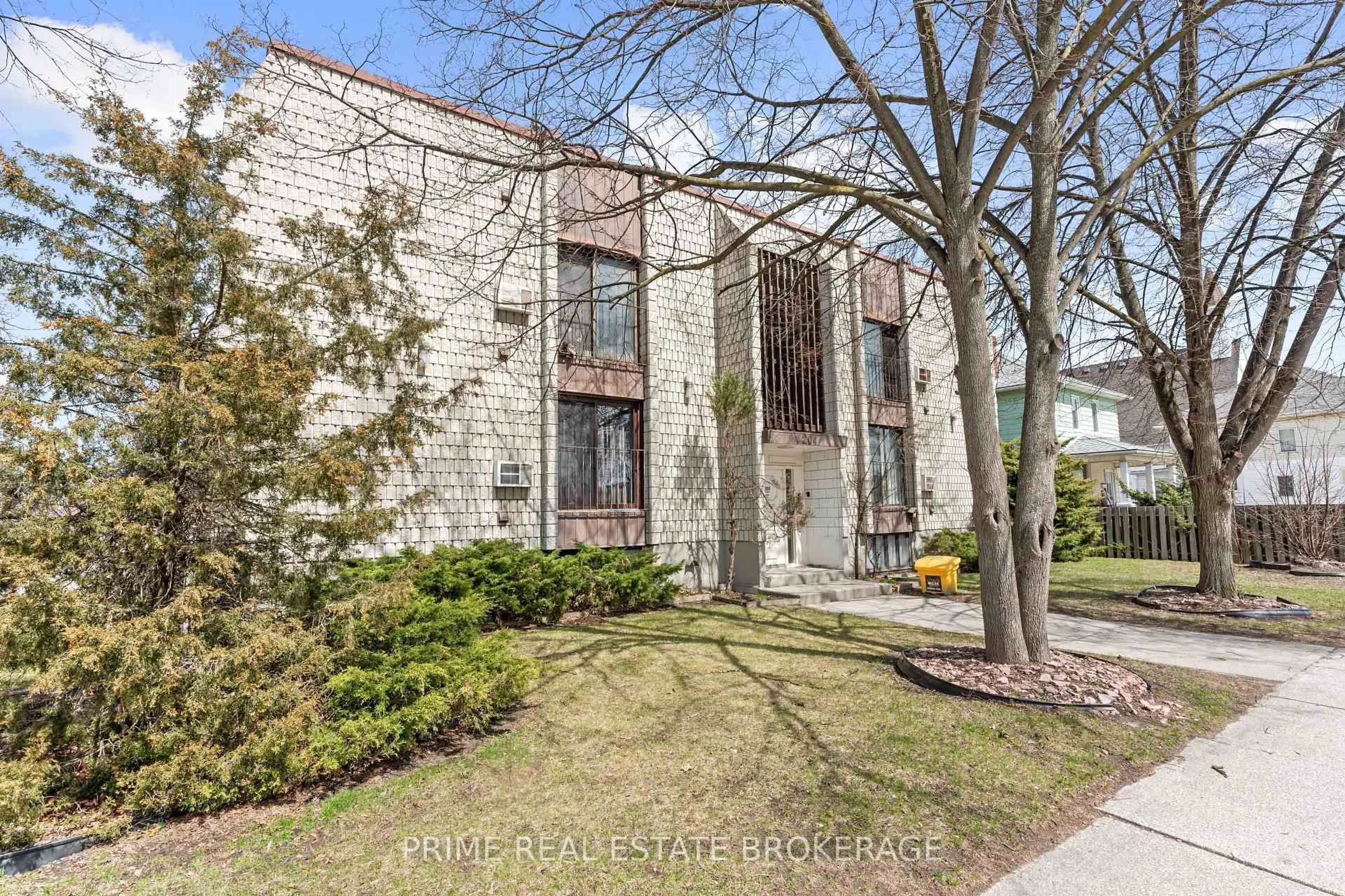 Home with brick exterior material, street for 204 Michigan Ave, Point Edward Ontario N7V 1E8