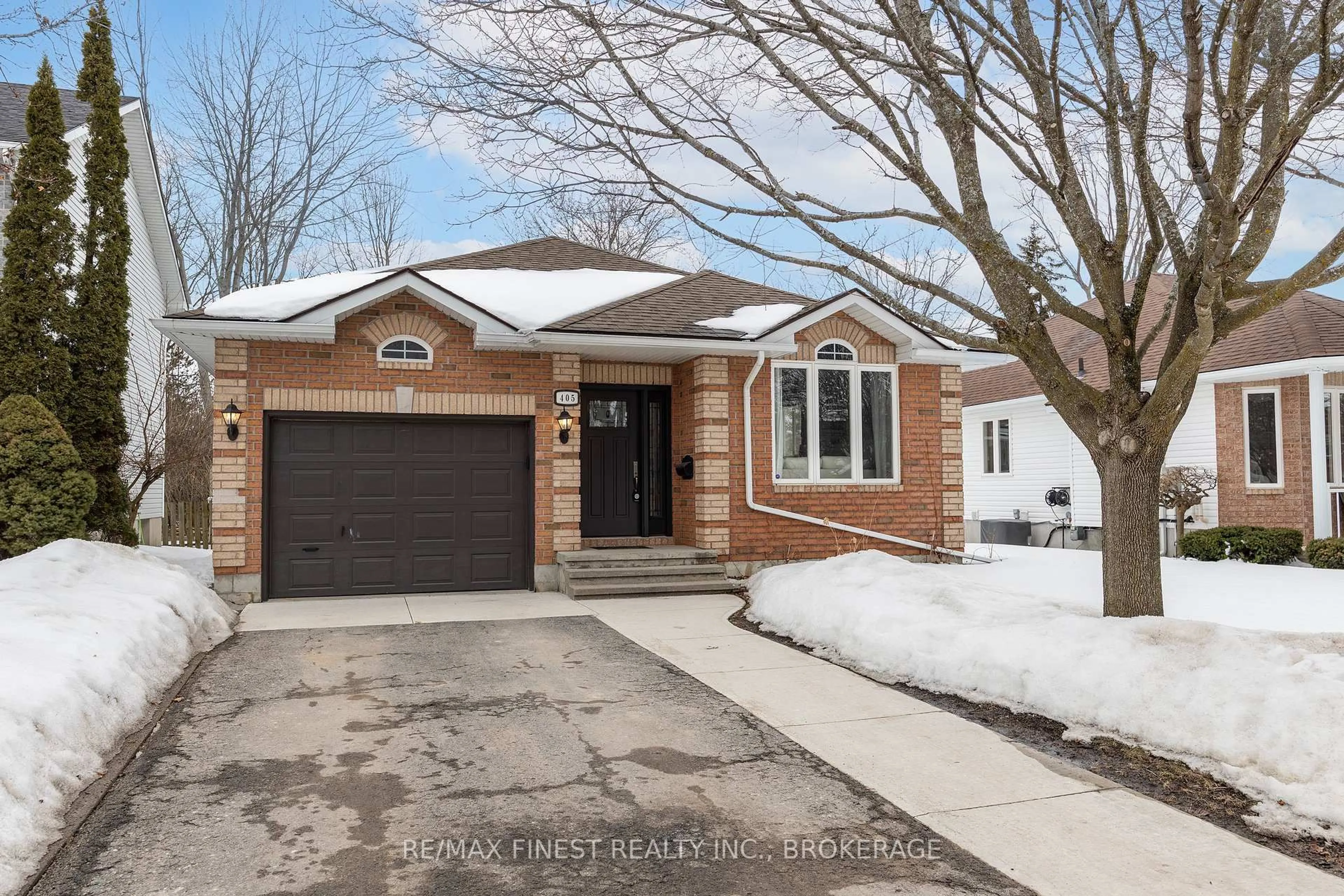 Home with brick exterior material, street for 405 Fieldstone Dr, Kingston Ontario K7K 7E1