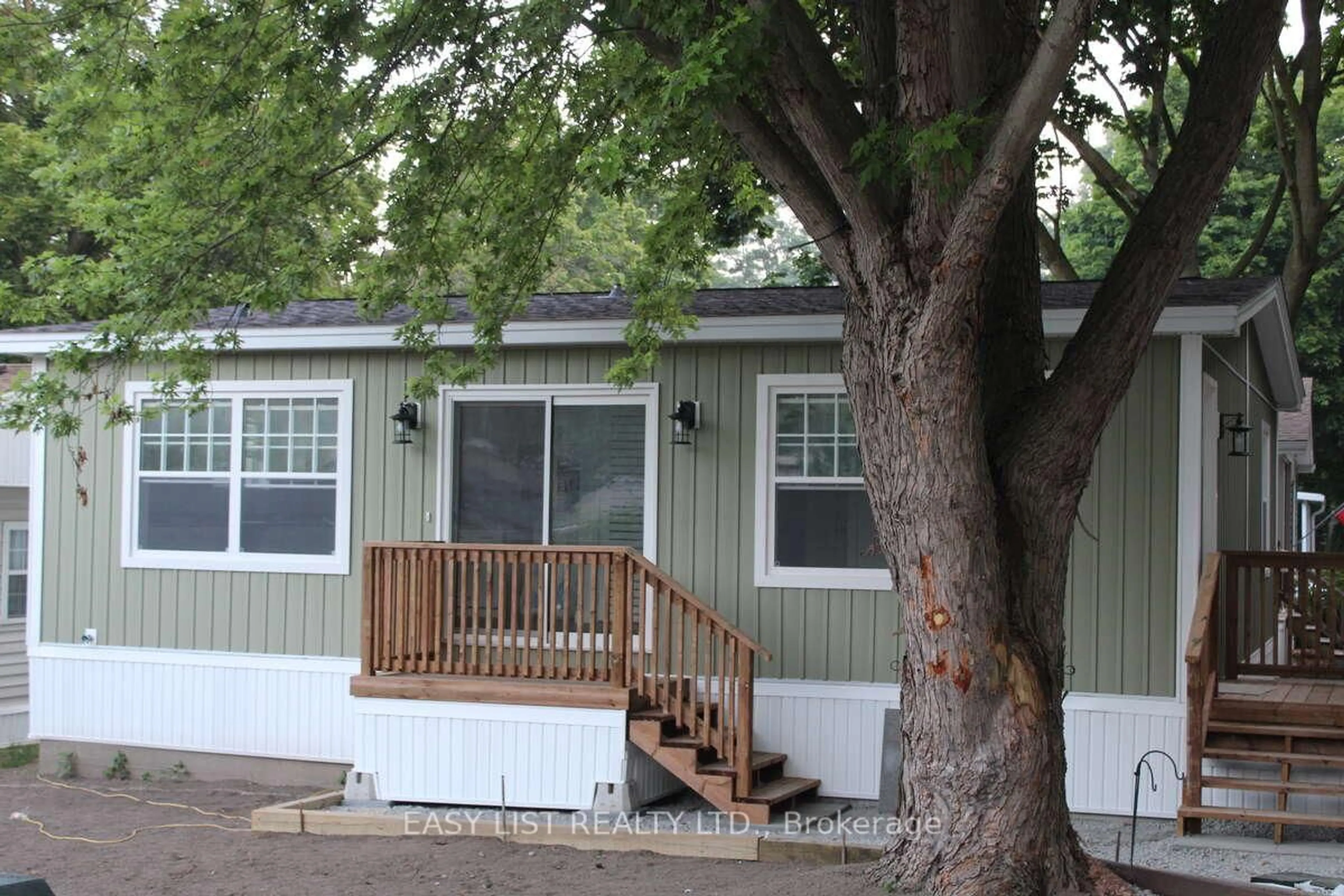 Home with vinyl exterior material, street for 23 Four Mile Creek Rd #472, Niagara-on-the-Lake Ontario L0S 1J1