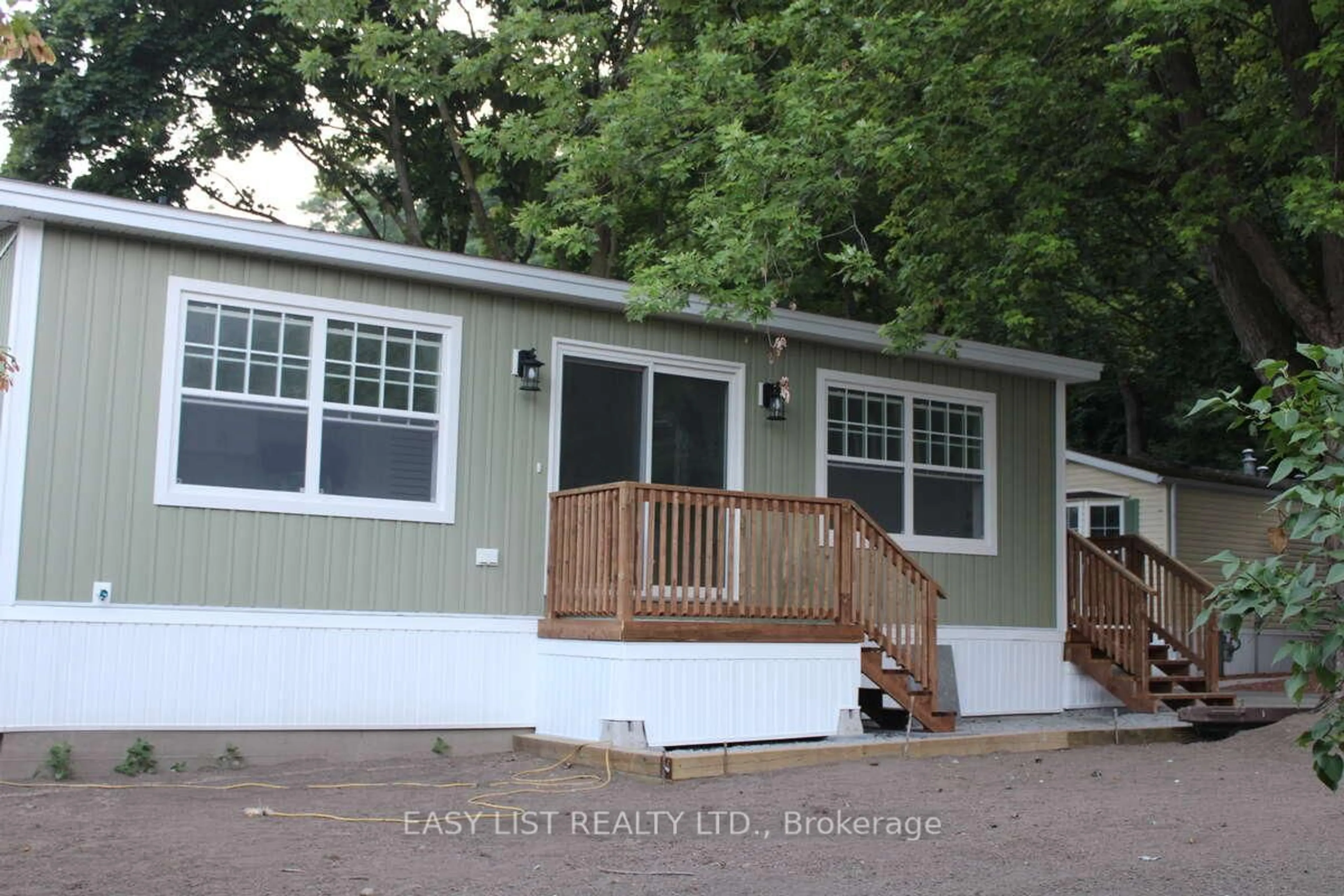 Home with vinyl exterior material, street for 23 Four Mile Creek Rd #472, Niagara-on-the-Lake Ontario L0S 1J1