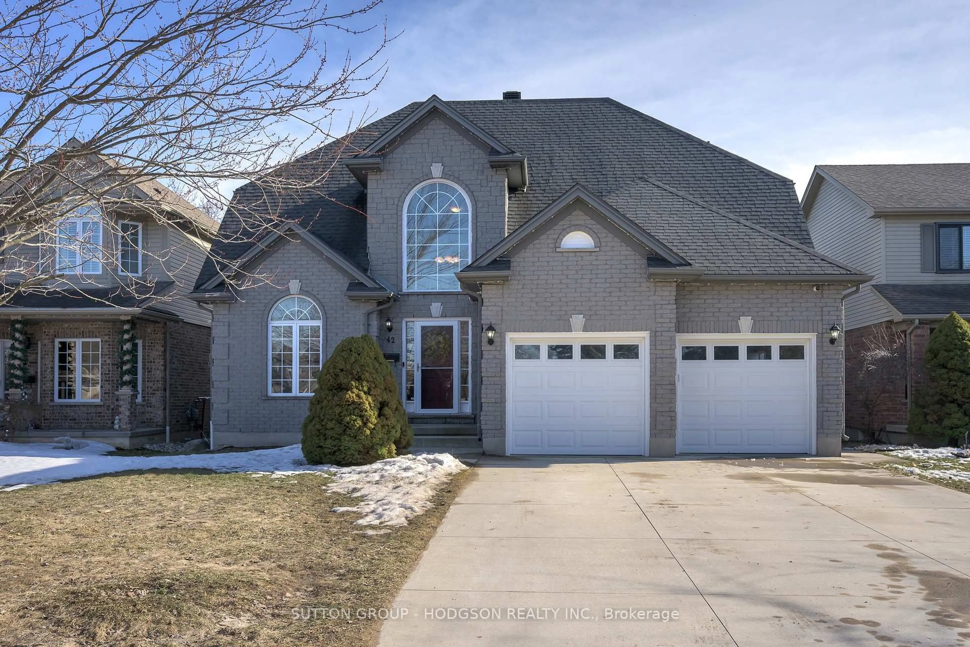 Home with brick exterior material, street for 42 Oakmont Gdns, Middlesex Centre Ontario N0M 2A0