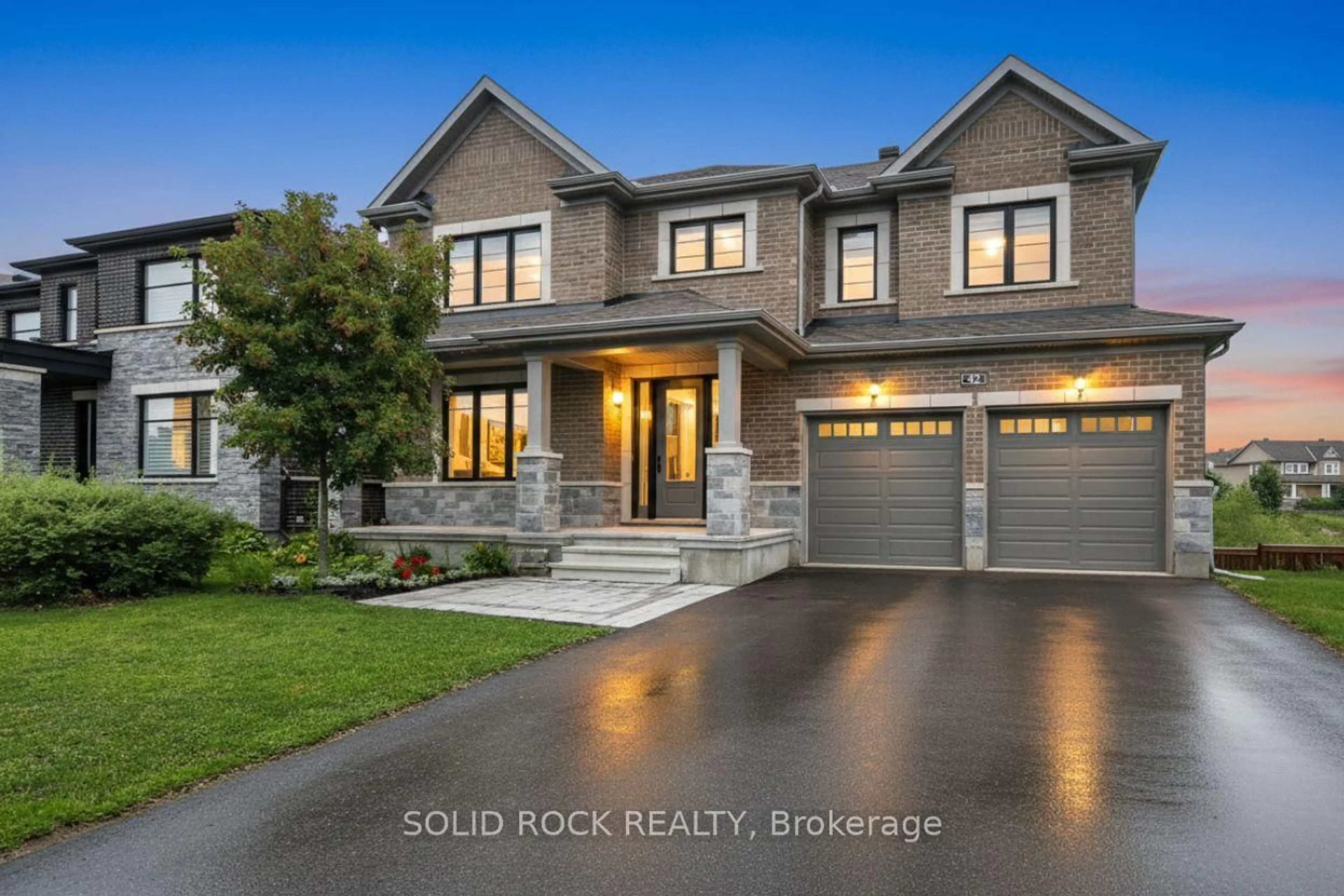 Home with brick exterior material, street for 42 Conch Way, Manotick Ontario K4M 0M4
