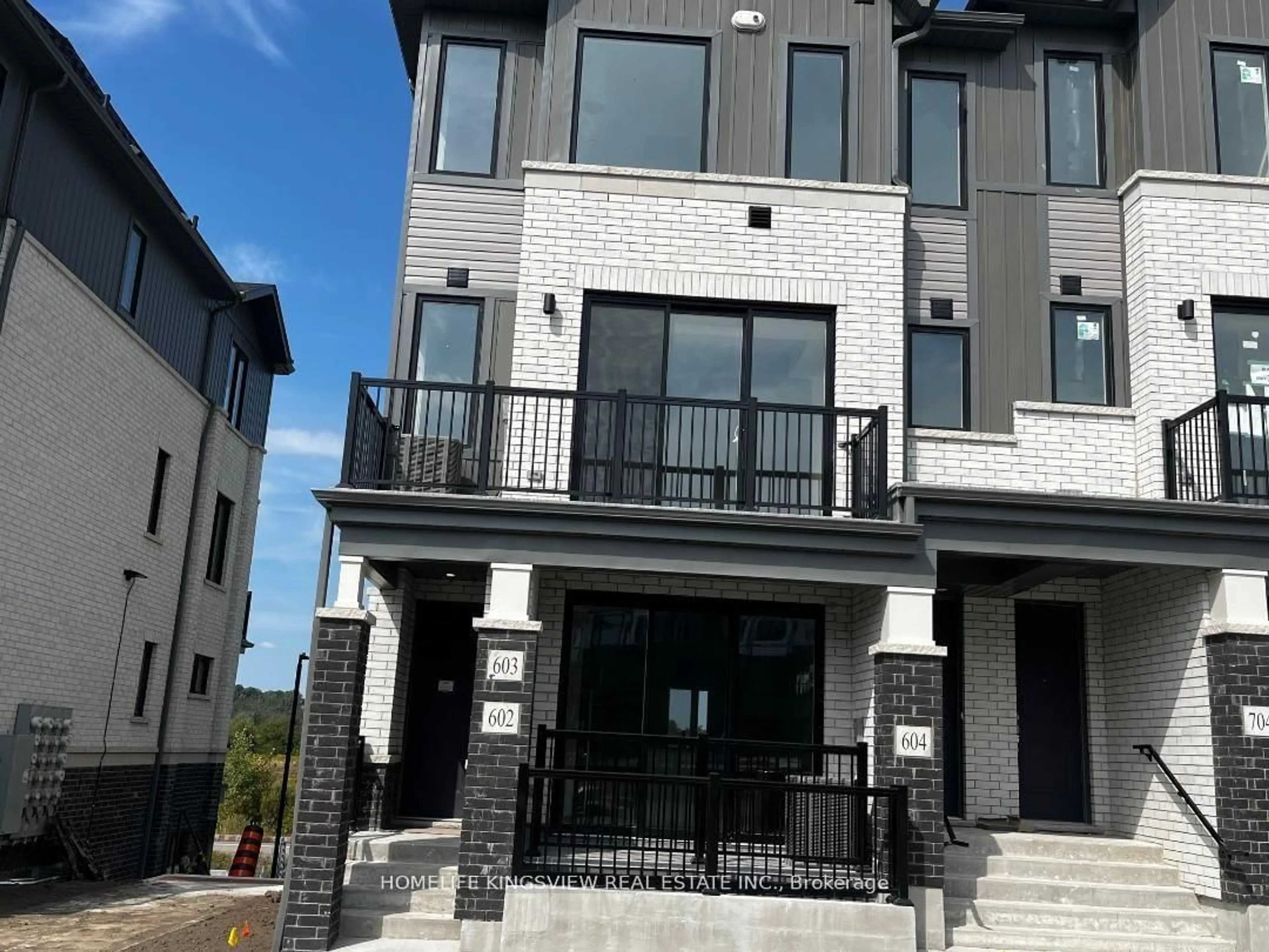 Home with brick exterior material, street for 160 Densmore Rd #602, Cobourg Ontario K9A 0X8