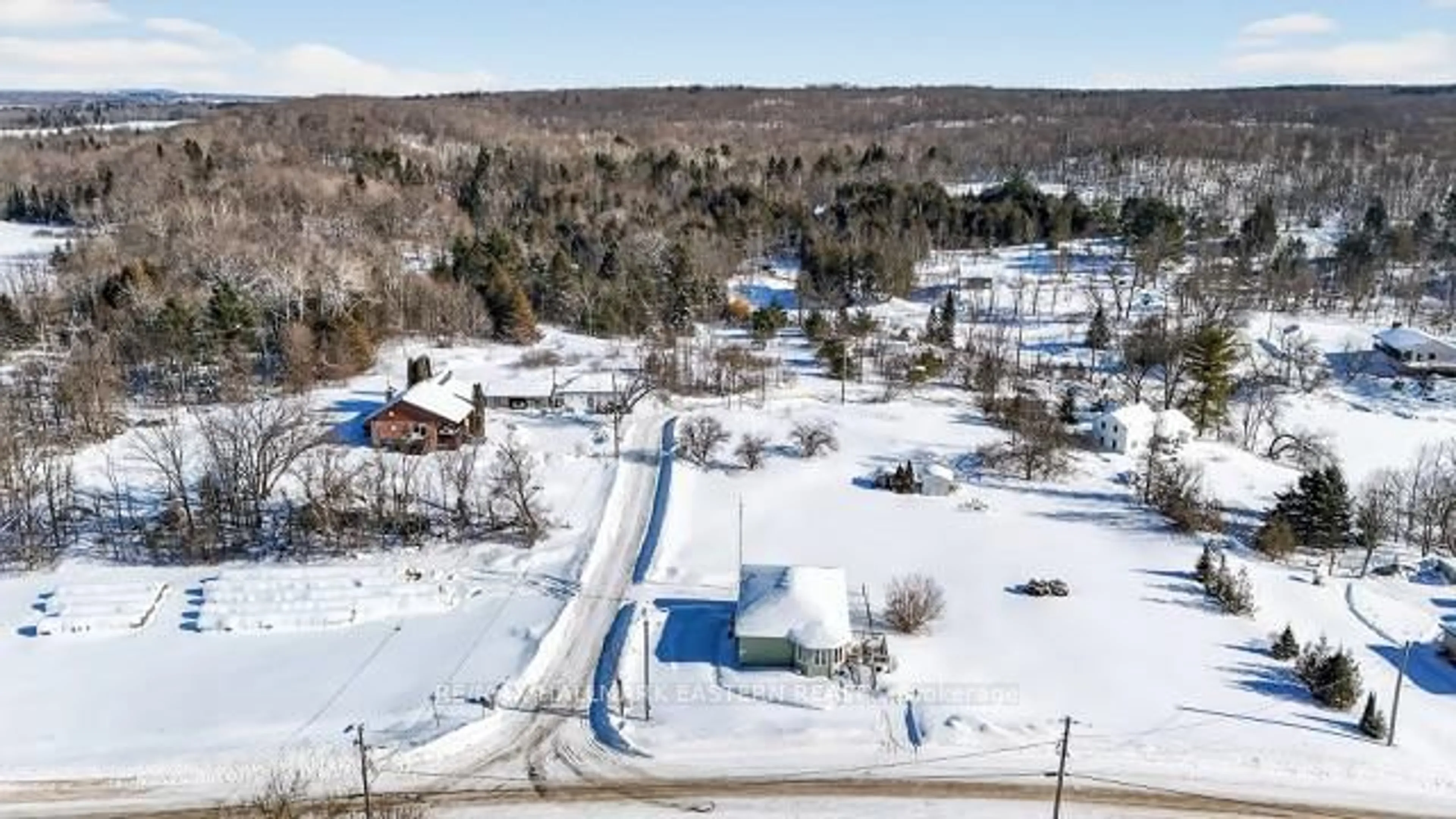 A pic from outside/outdoor area/front of a property/back of a property/a pic from drone, mountain view for 12 Malone Quarry Rd, Limoges Ontario K0K 2M0