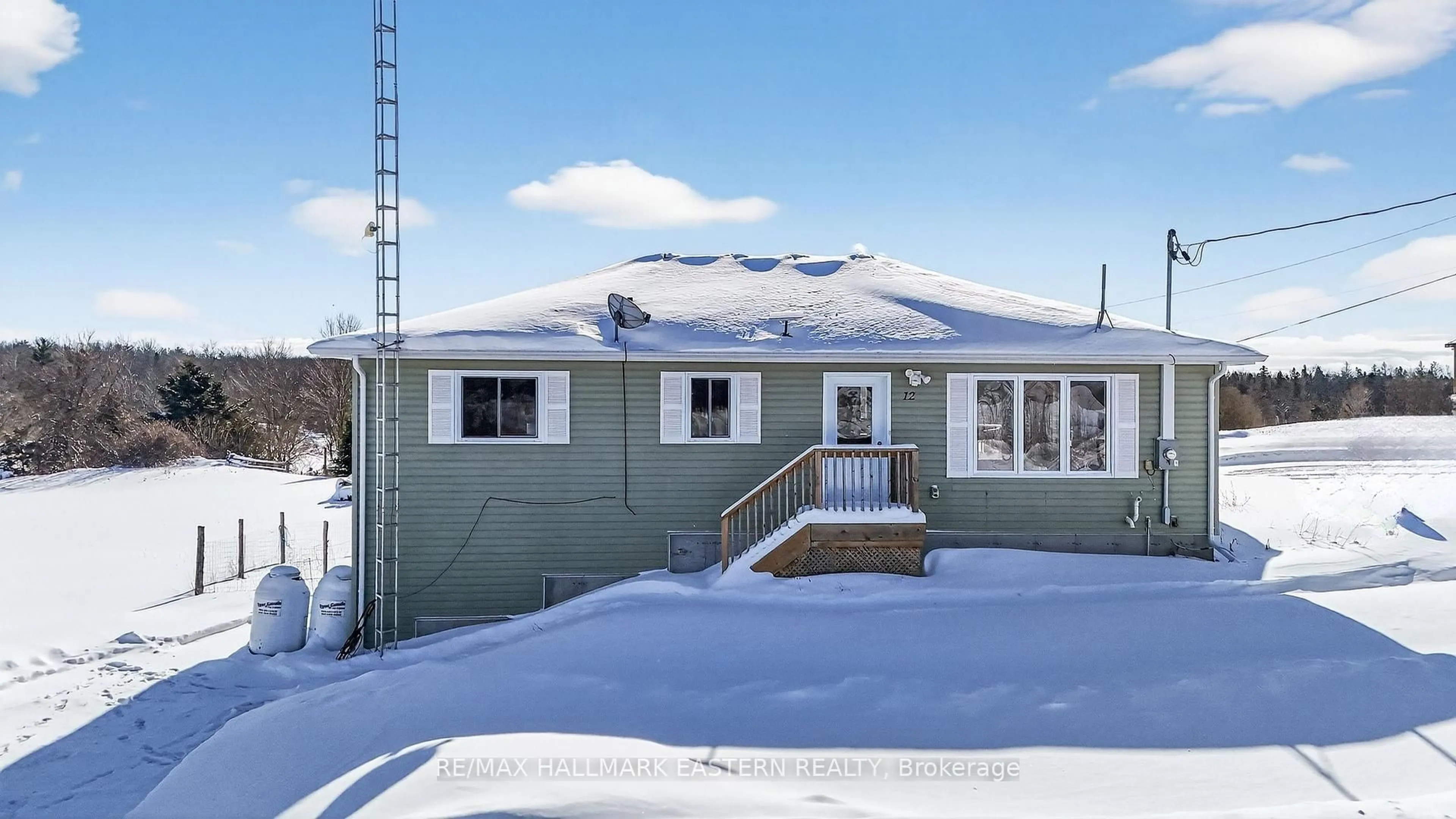 Home with vinyl exterior material, street for 12 Malone Quarry Rd, Limoges Ontario K0K 2M0