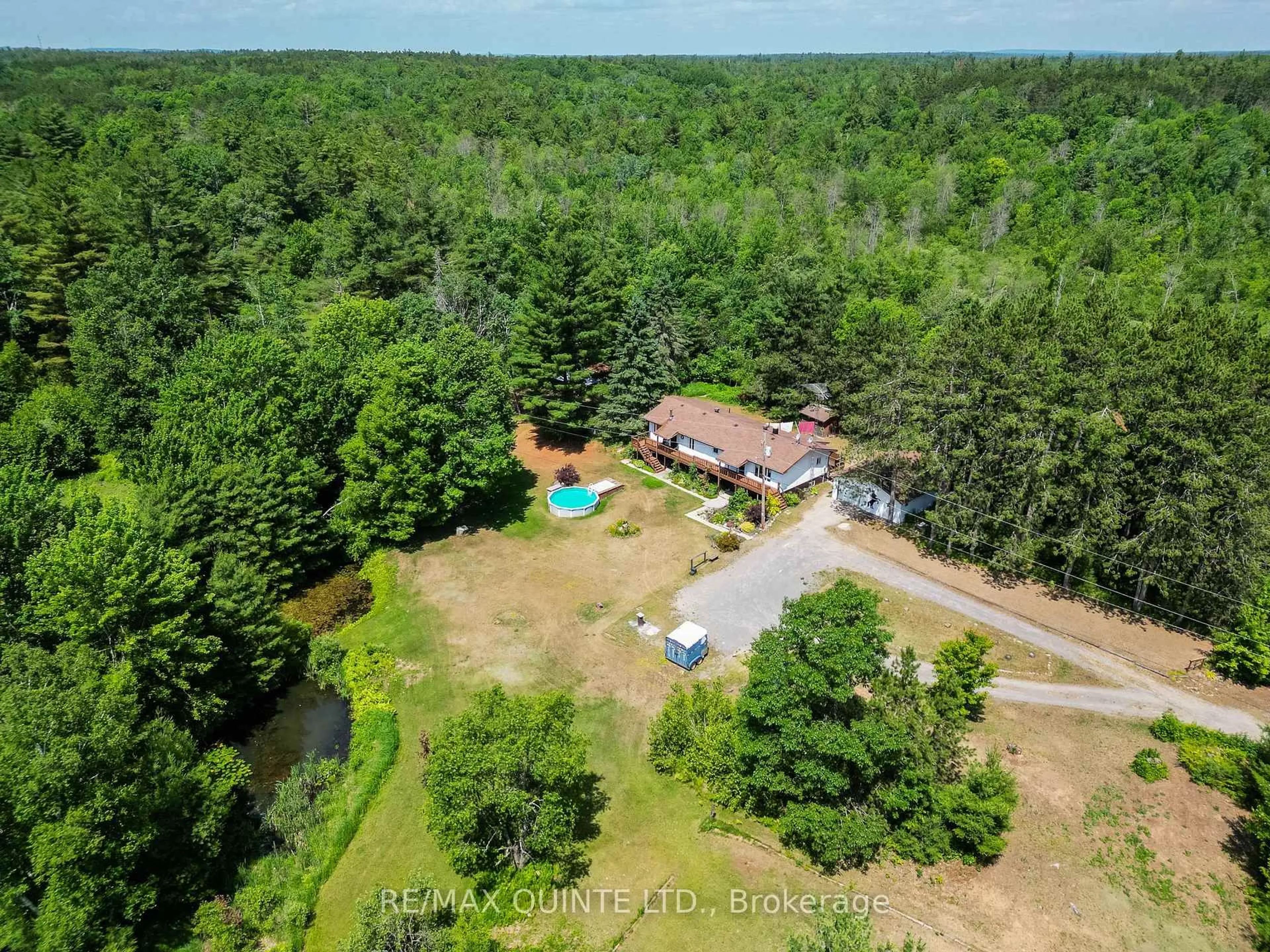 A pic from outside/outdoor area/front of a property/back of a property/a pic from drone, forest/trees view for 690 Potter Settlement Rd, Tweed Ontario K0K 3J0