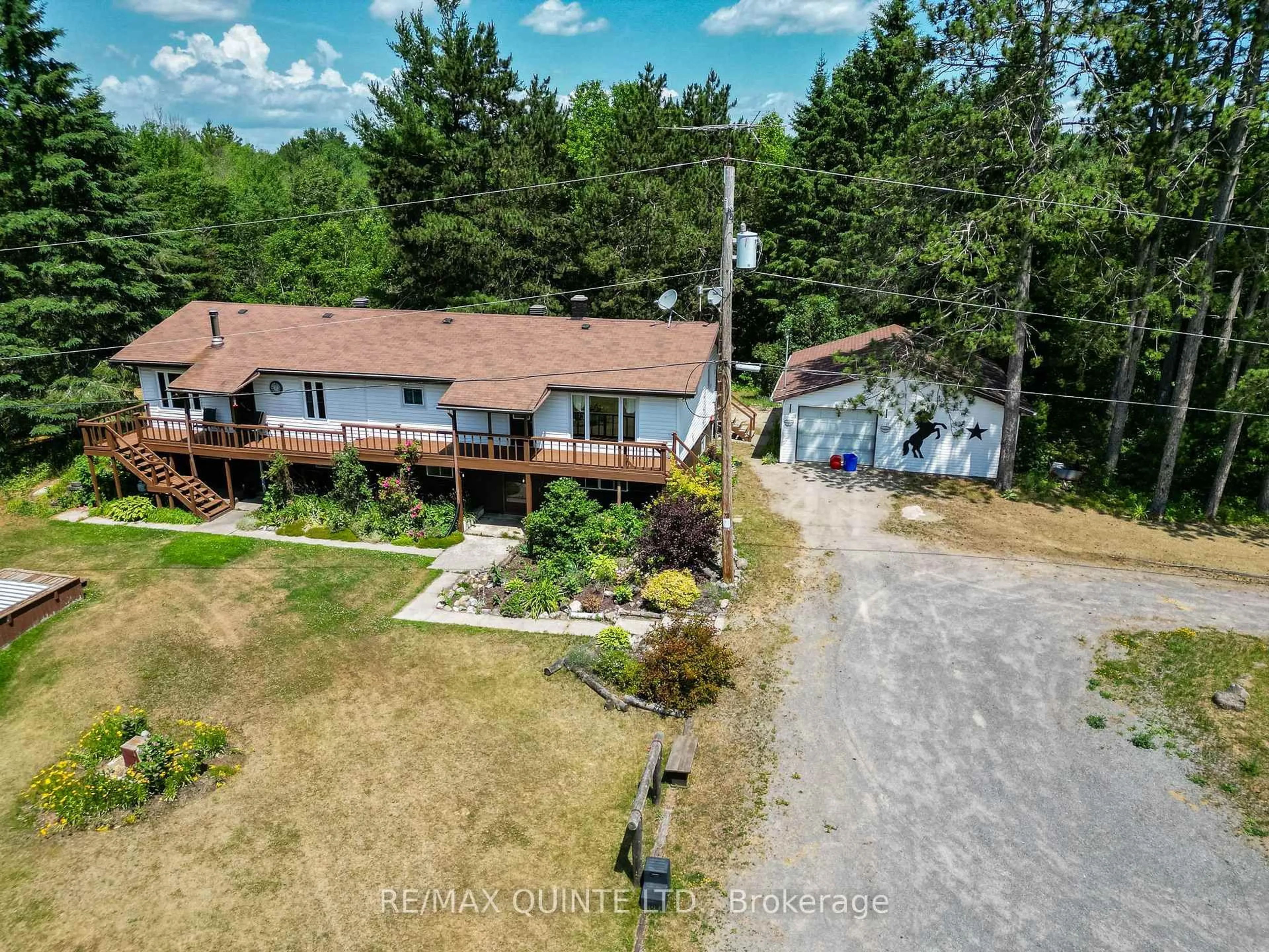 A pic from outside/outdoor area/front of a property/back of a property/a pic from drone, water/lake/river/ocean view for 690 Potter Settlement Rd, Tweed Ontario K0K 3J0
