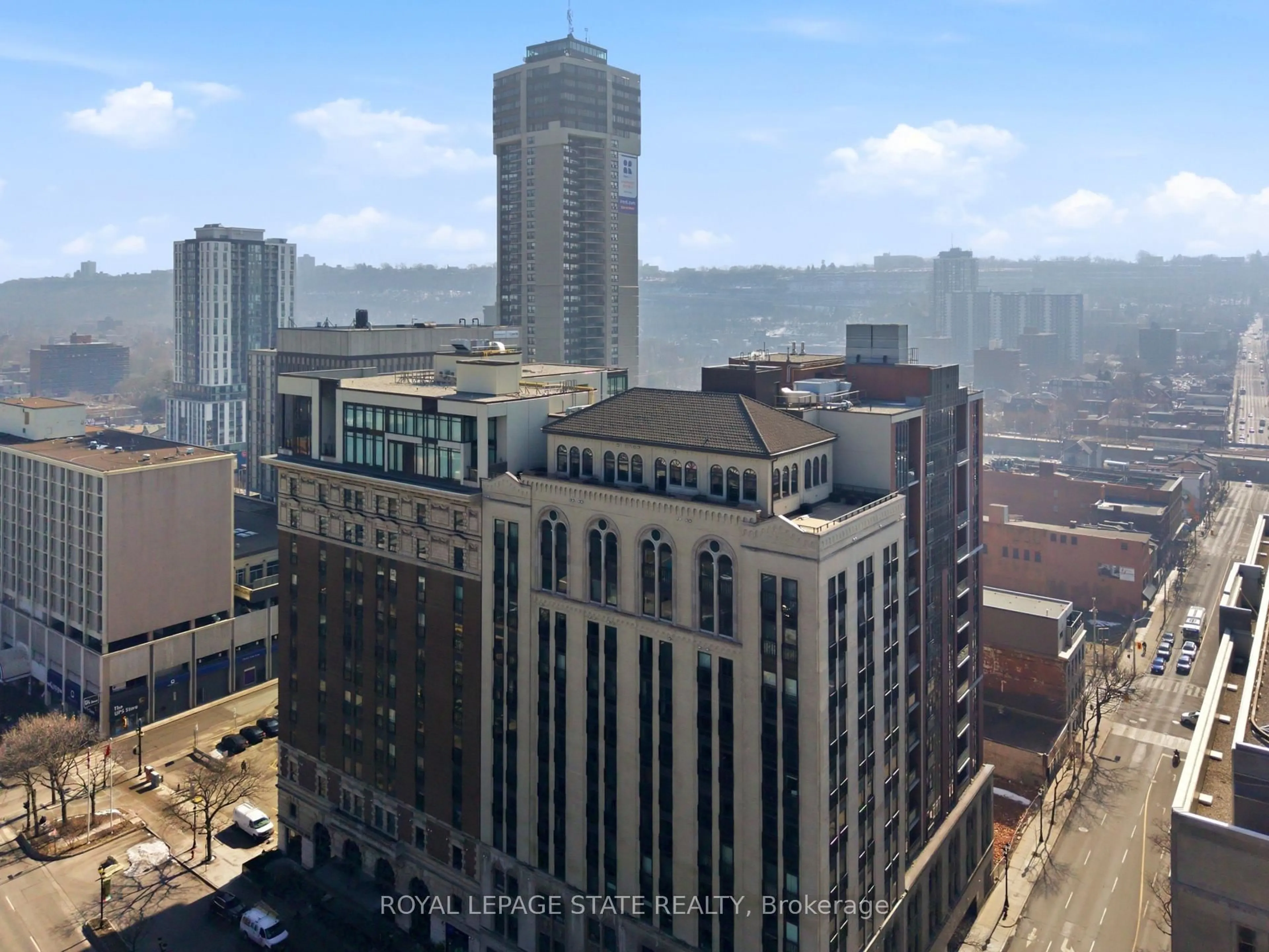 A pic from outside/outdoor area/front of a property/back of a property/a pic from drone, city buildings view from balcony for 112 King St #PH4, Hamilton Ontario L8N 1A8