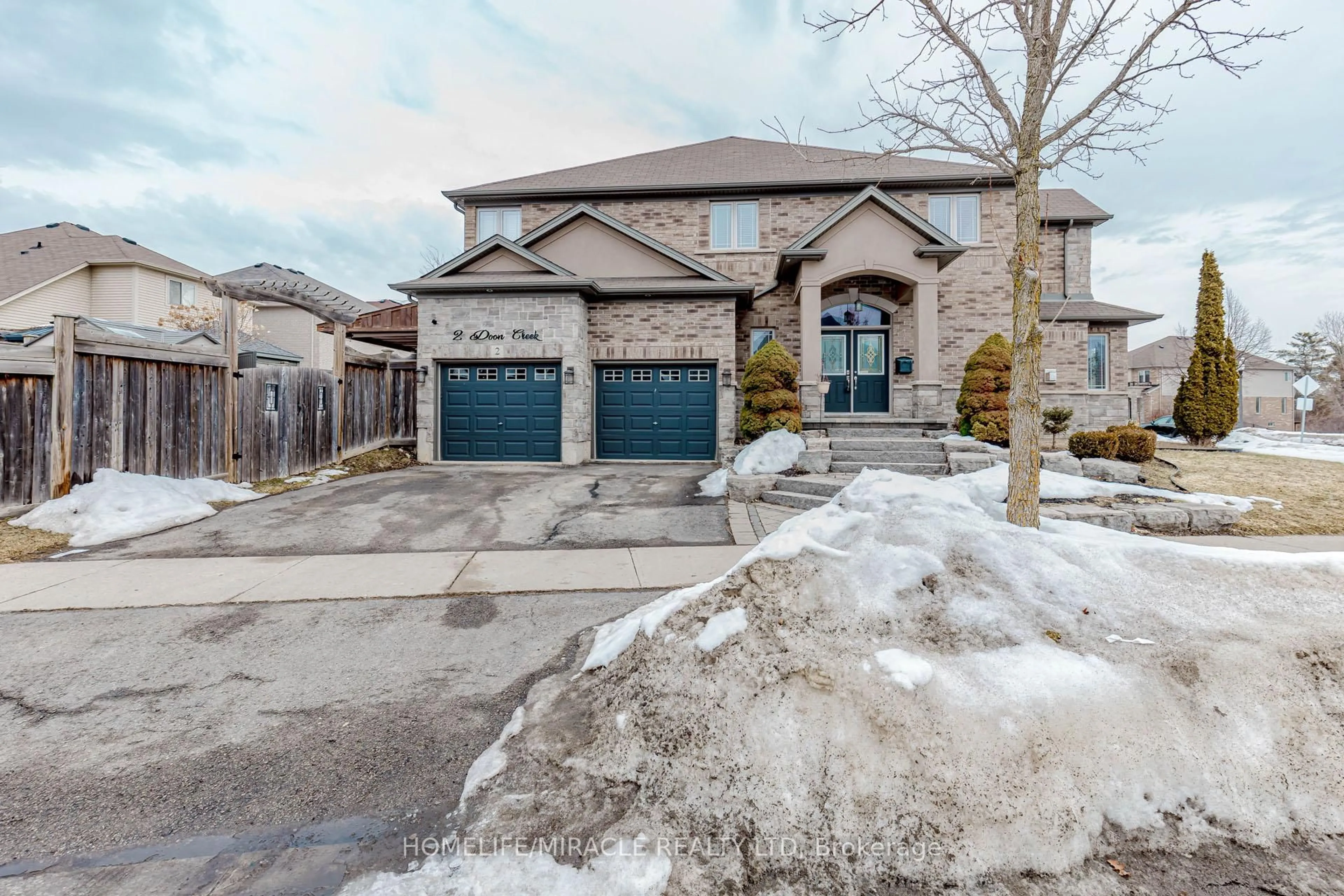 Home with brick exterior material, street for 2 Doon Creek St, Kitchener Ontario N2P 2R3