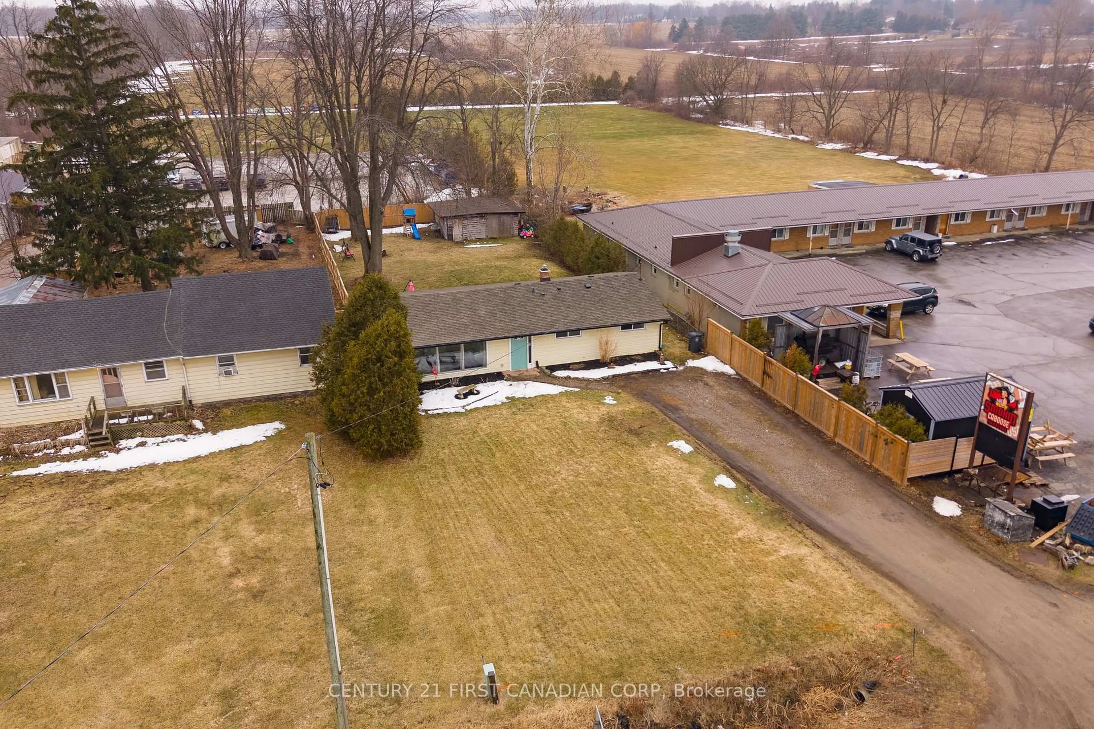 A pic from outside/outdoor area/front of a property/back of a property/a pic from drone, mountain view for 43747 Talbot Line, Central Elgin Ontario N5P 3S7