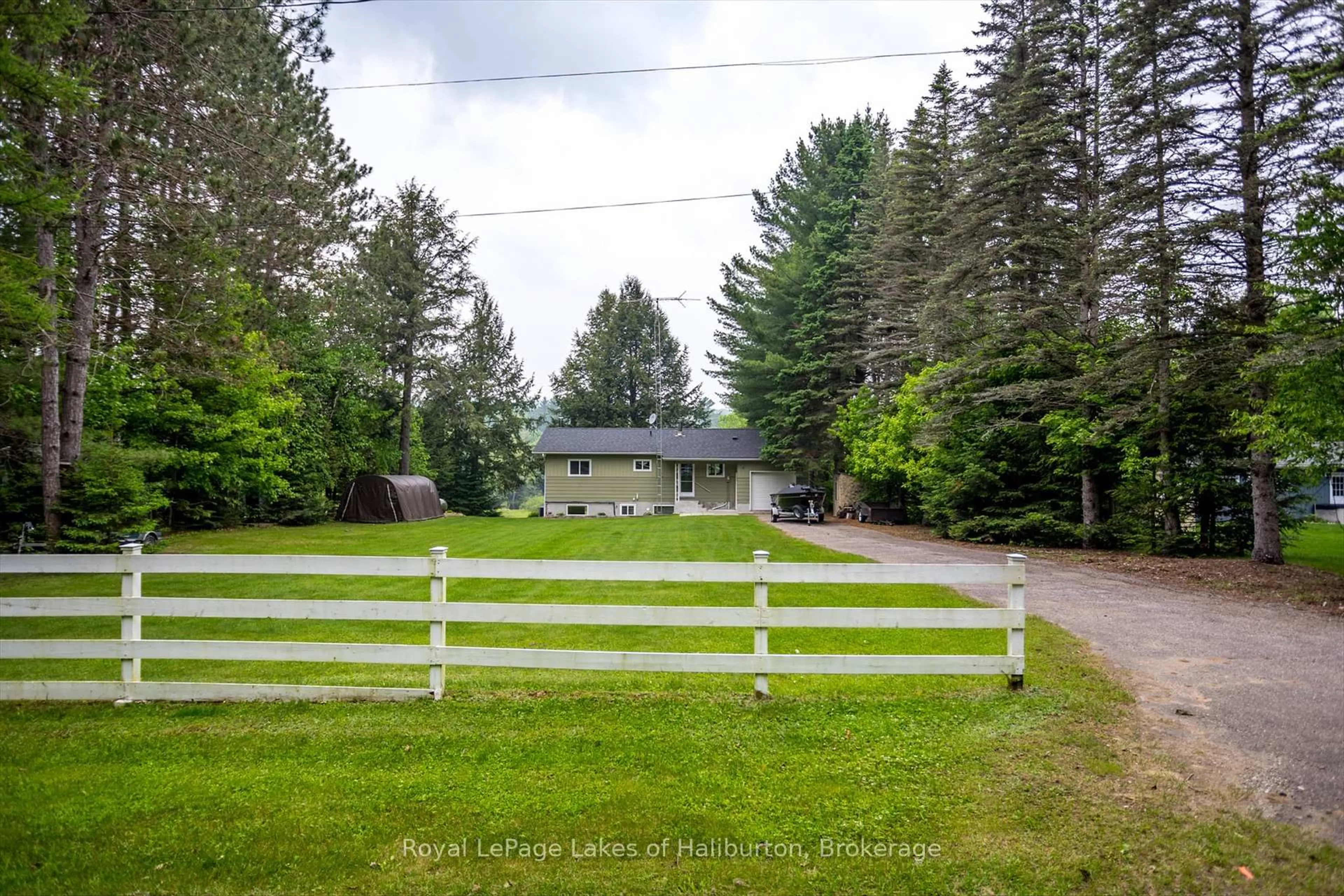 A pic from outside/outdoor area/front of a property/back of a property/a pic from drone, forest/trees view for 1093 Lamar Dr, Algonquin Highlands Ontario K0M 1S0
