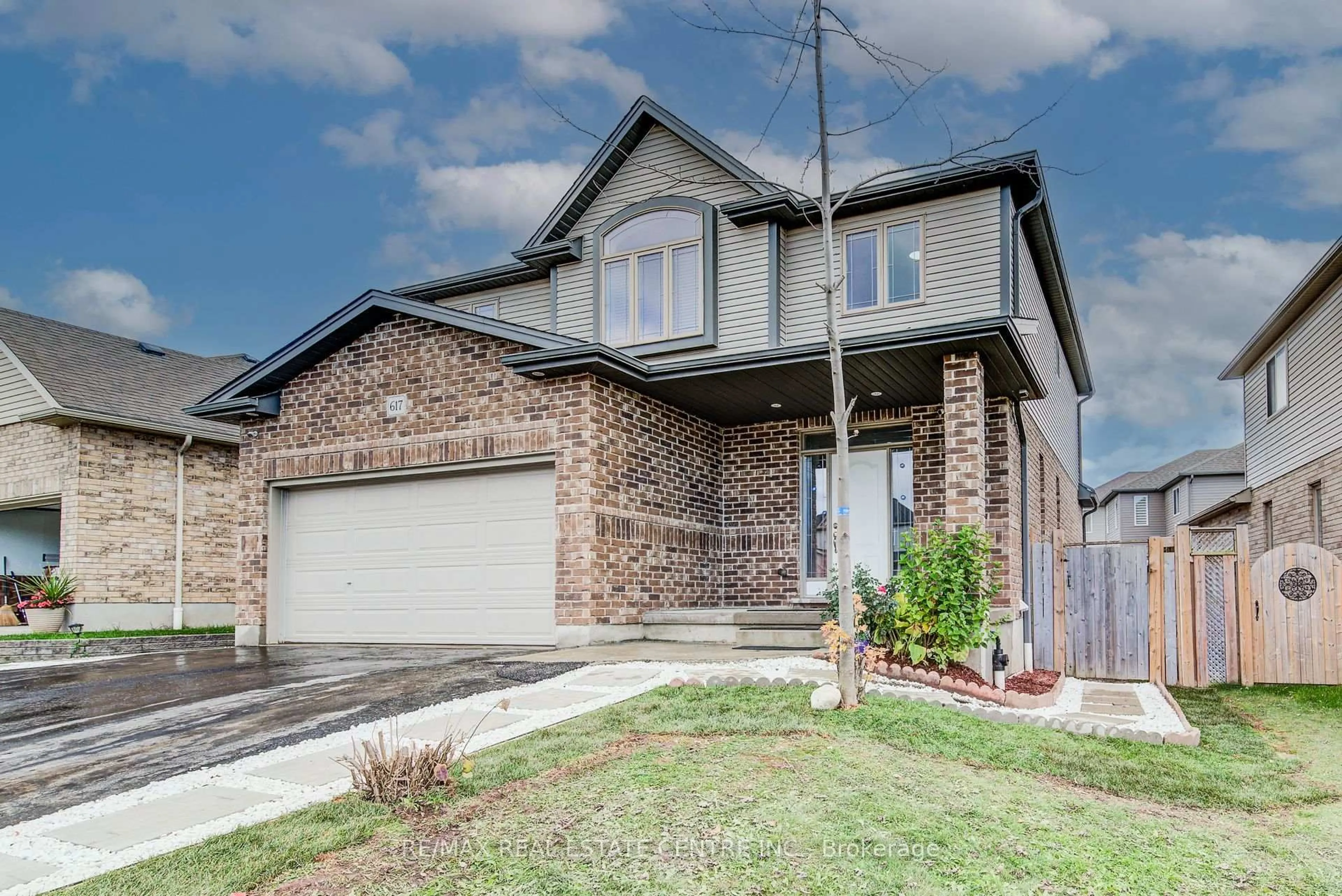 Home with brick exterior material, street for 617 Thorndale Dr, Waterloo Ontario N2T 0A9