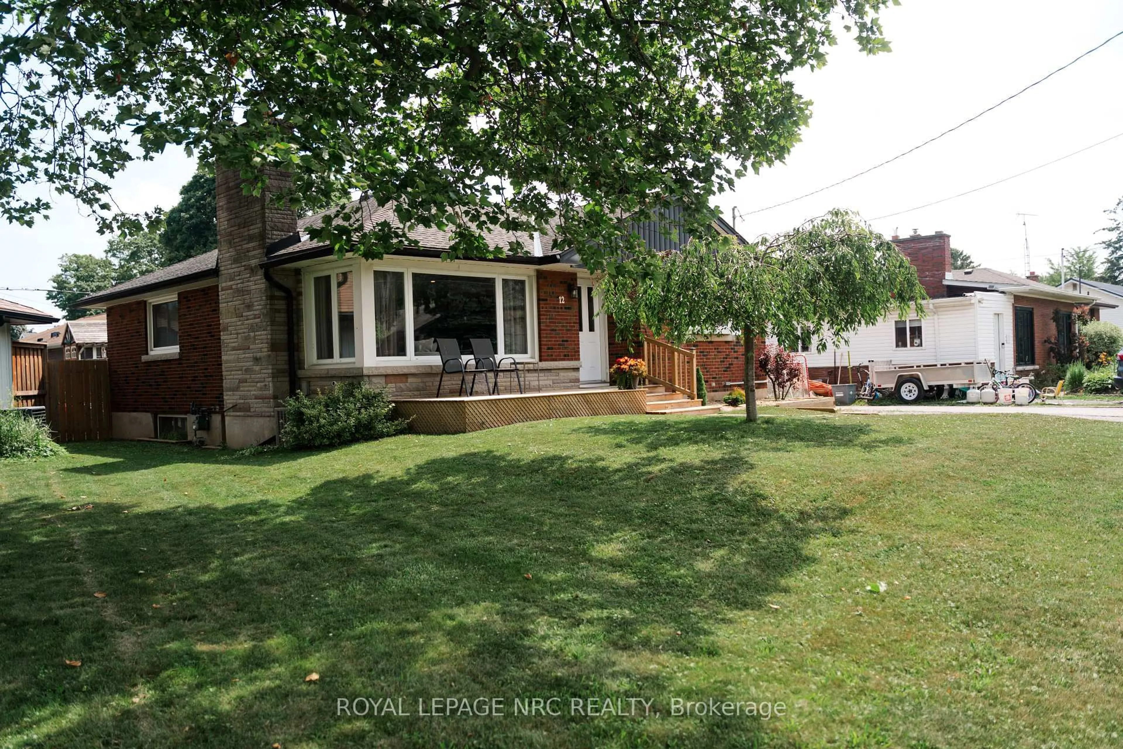 A pic from outside/outdoor area/front of a property/back of a property/a pic from drone, street for 12 Mackie St, St. Catharines Ontario L2N 5N5