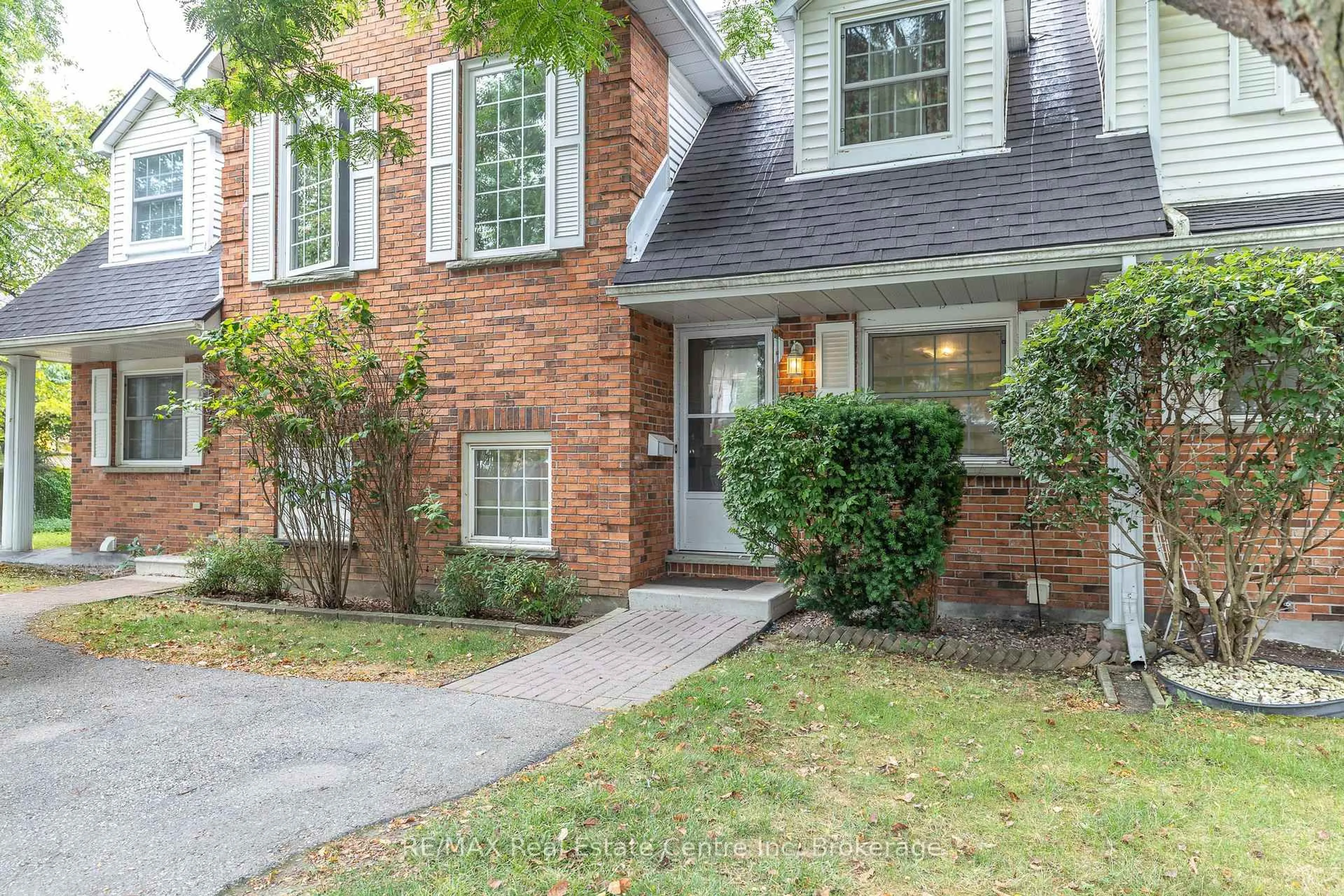 Home with brick exterior material, street for 129 Victoria Rd #74, Guelph Ontario N1E 6V4