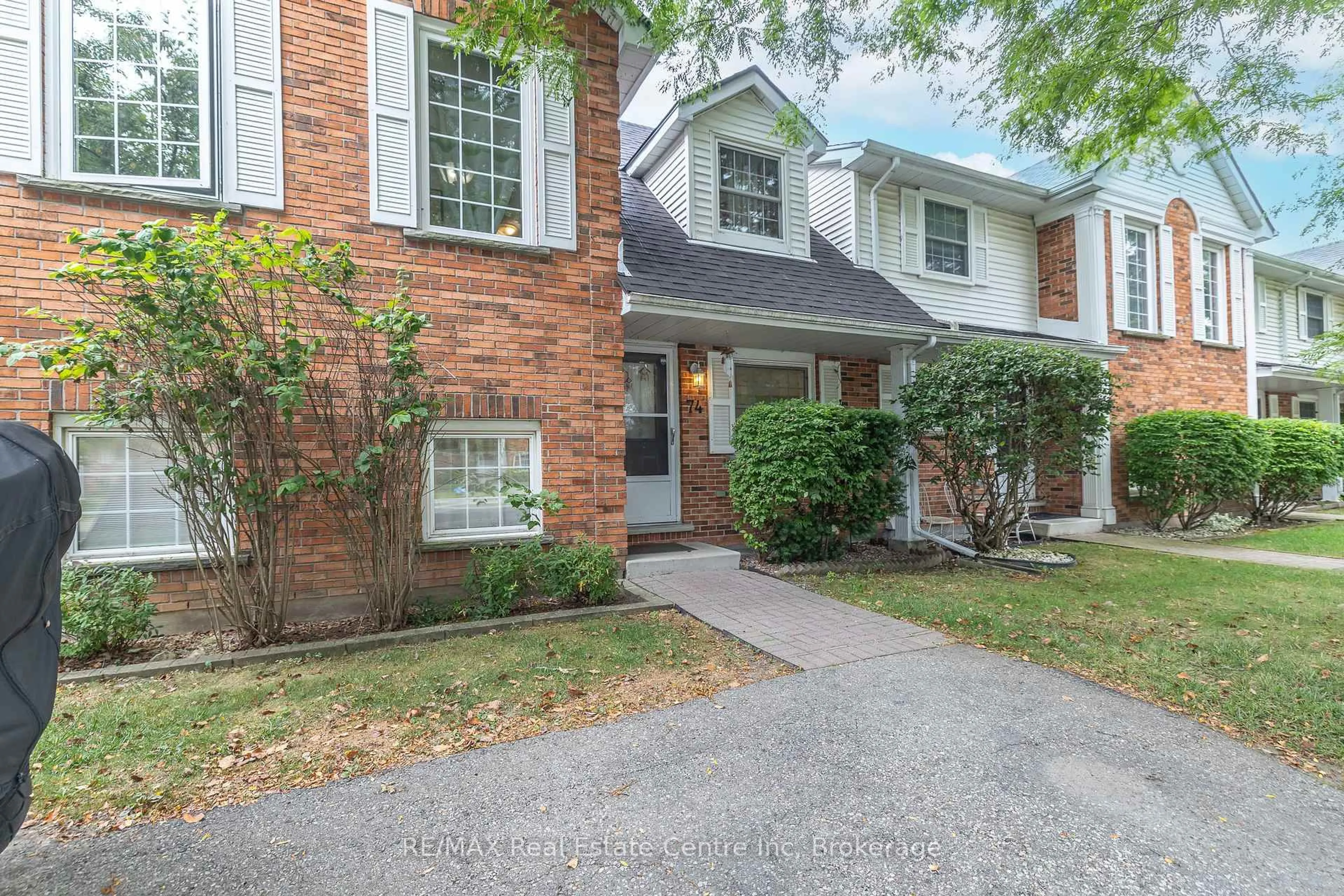 Home with brick exterior material, street for 129 Victoria Rd #74, Guelph Ontario N1E 6V4