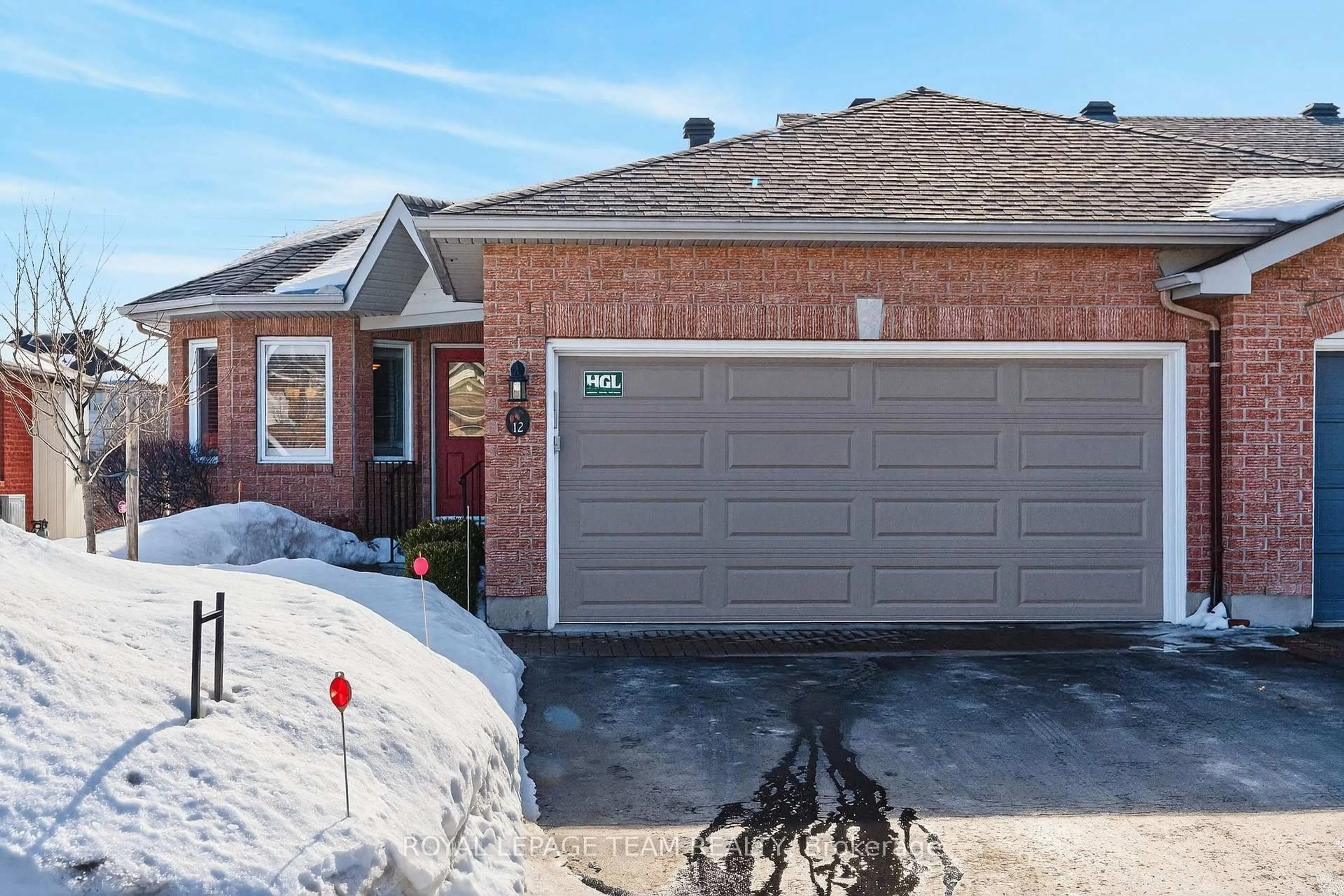 Home with brick exterior material, street for 12 Partridge Dr, Ottawa Ontario K2M 2P6