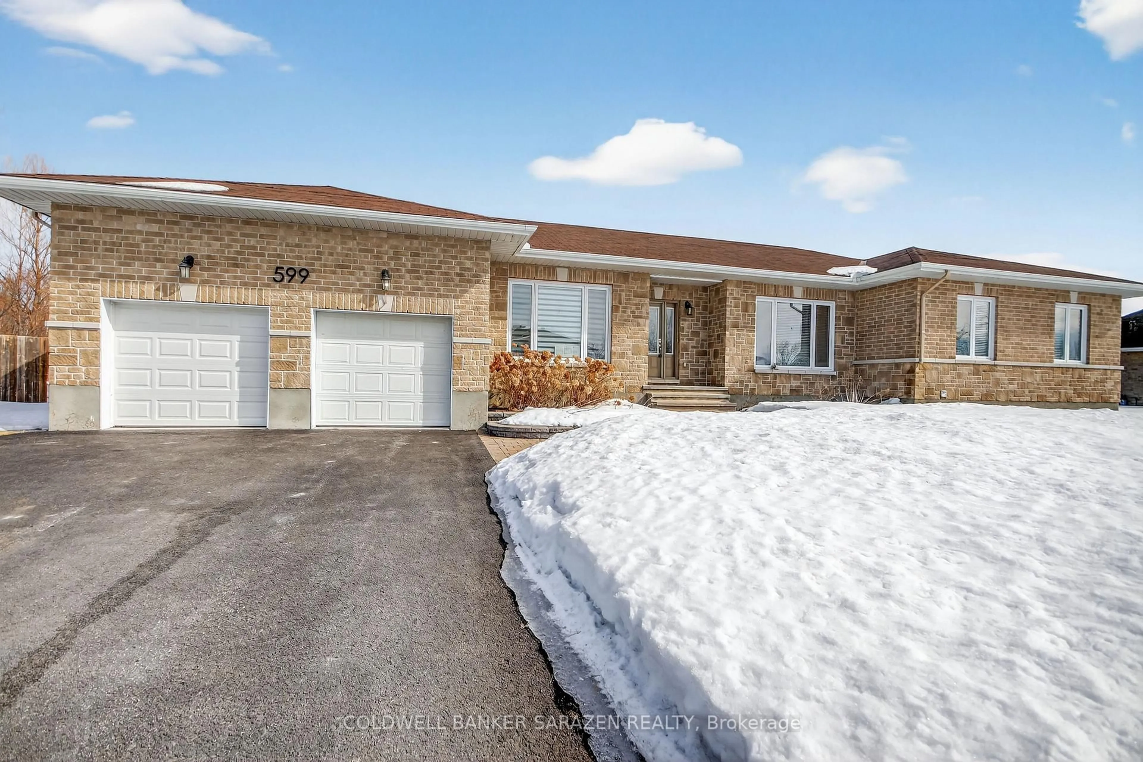 Home with brick exterior material, street for 599 Ballycastle Cres, Ottawa Ontario K1X 0A2