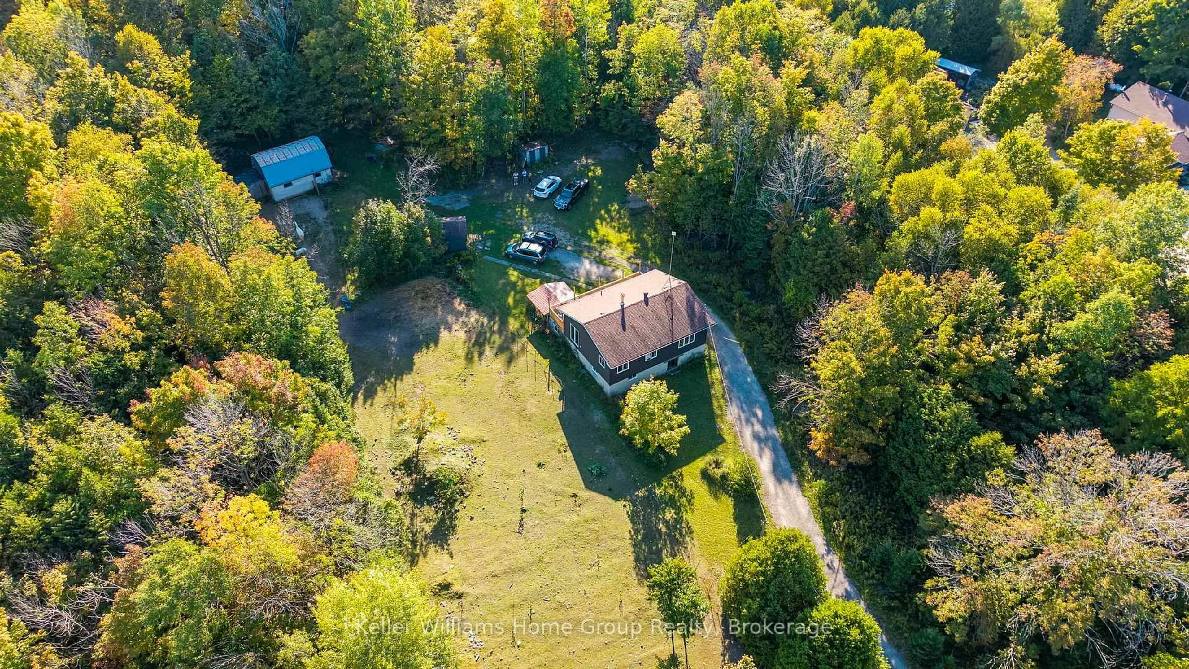 A pic from outside/outdoor area/front of a property/back of a property/a pic from drone, forest/trees view for 125 North Diagonal Rd, South Bruce Peninsula Ontario N0H 2T0