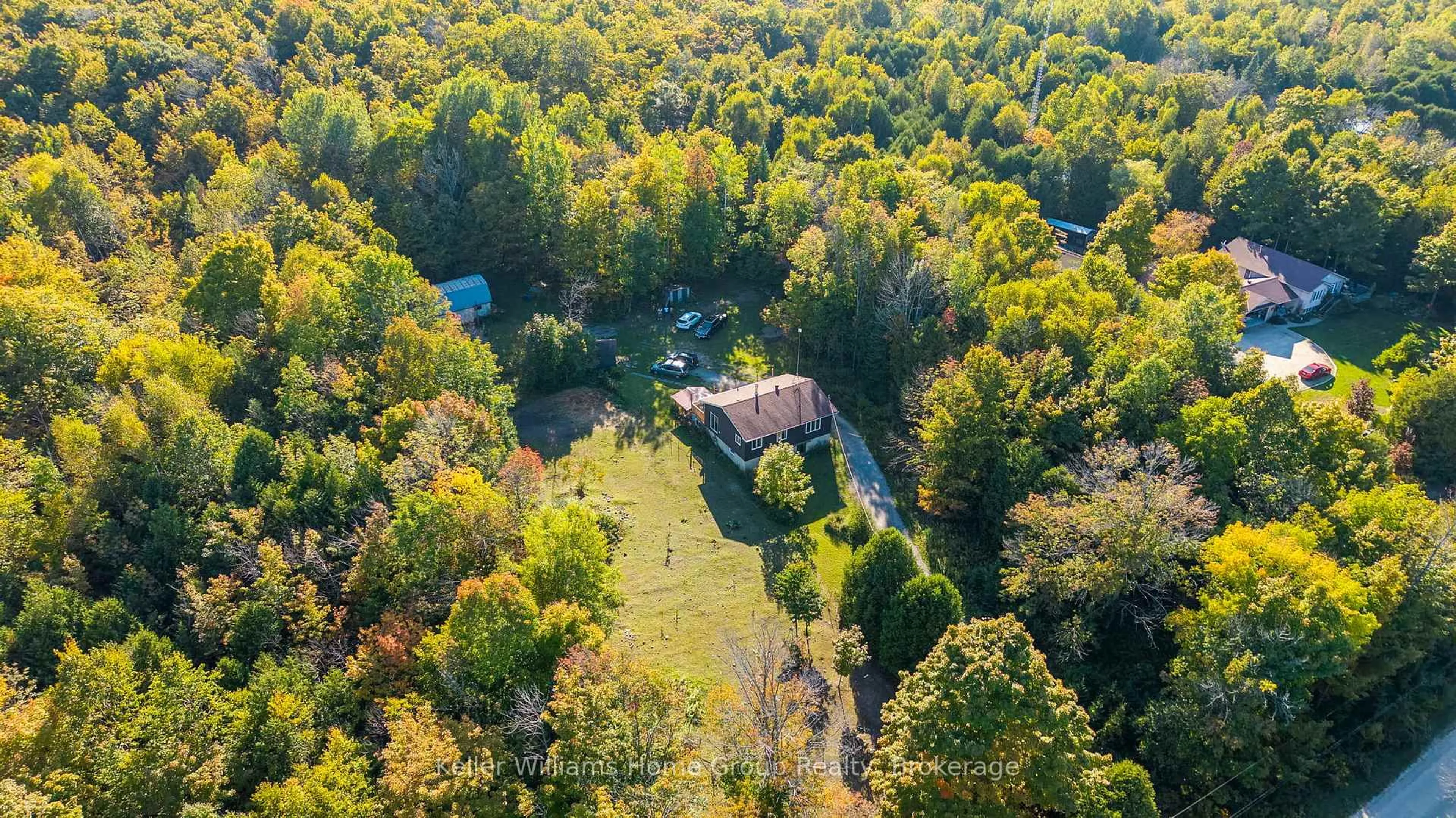 A pic from outside/outdoor area/front of a property/back of a property/a pic from drone, forest/trees view for 125 North Diagonal Rd, South Bruce Peninsula Ontario N0H 2T0