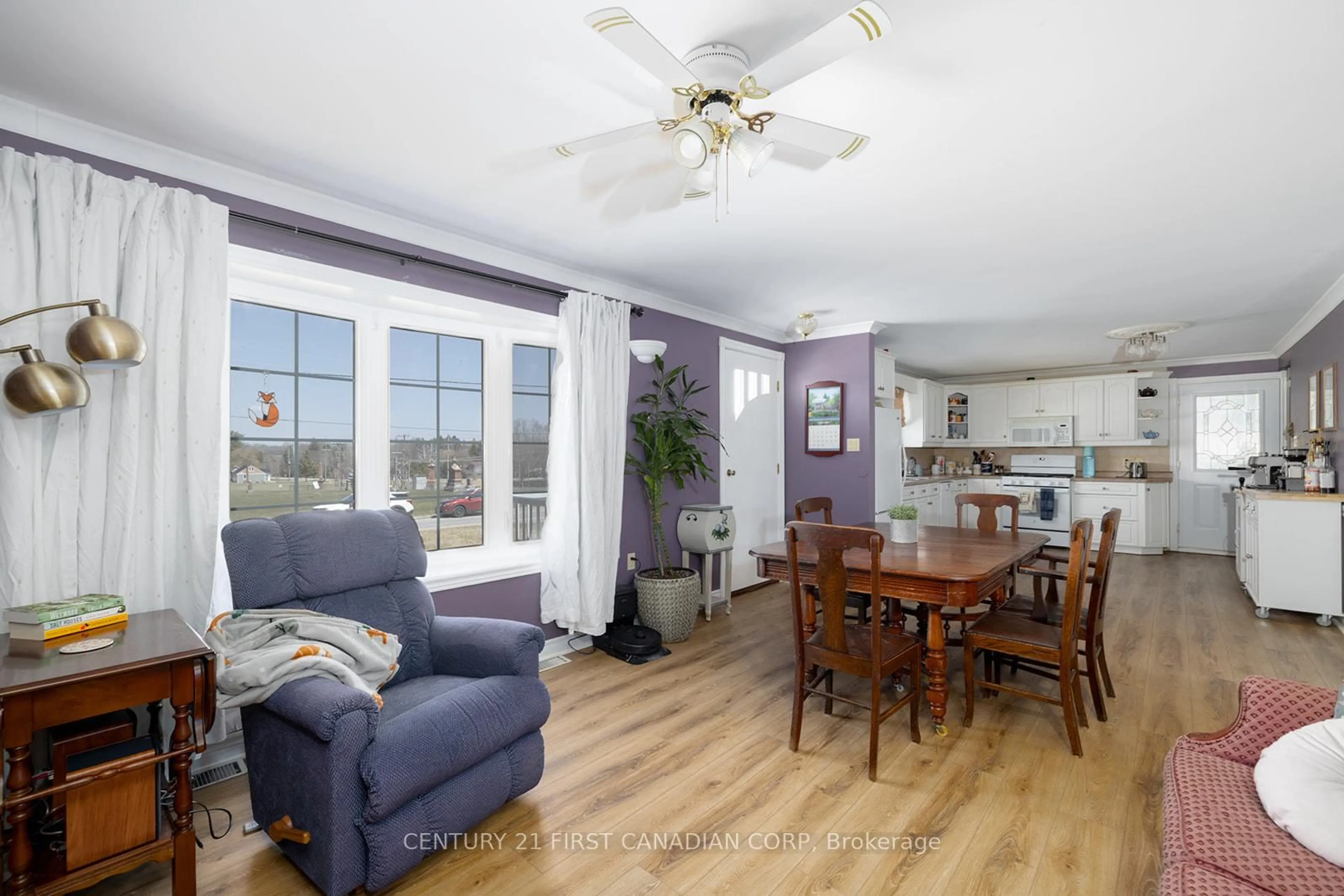 Living room with furniture, wood/laminate floor for 43409 Sparta Line, Central Elgin Ontario N5P 3S8