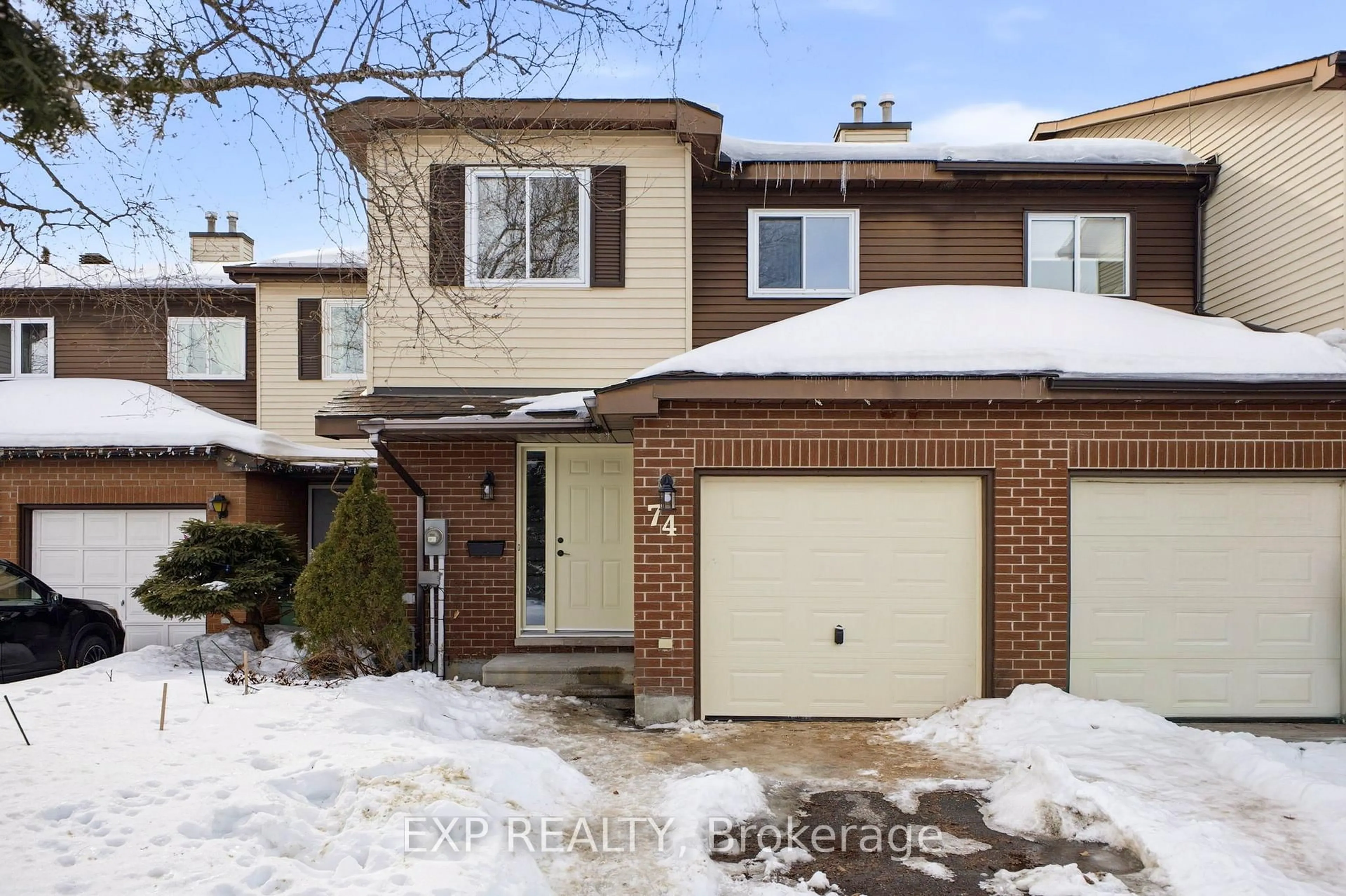 Home with brick exterior material, street for 74 Shearer Cres, Kanata Ontario K2L 3N1