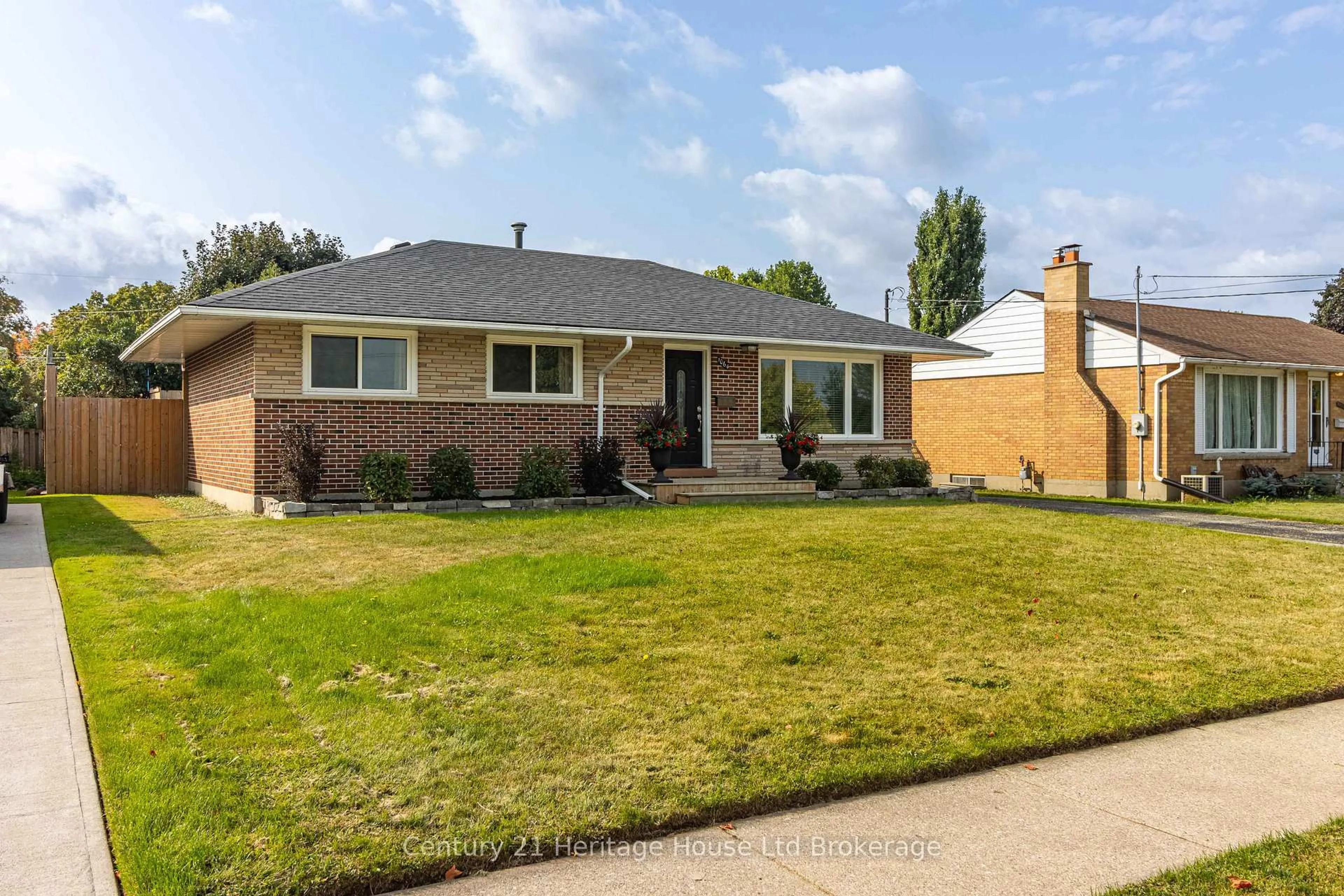 Home with brick exterior material, street for 1064 Sovereign Rd, Woodstock Ontario N4S 5P2