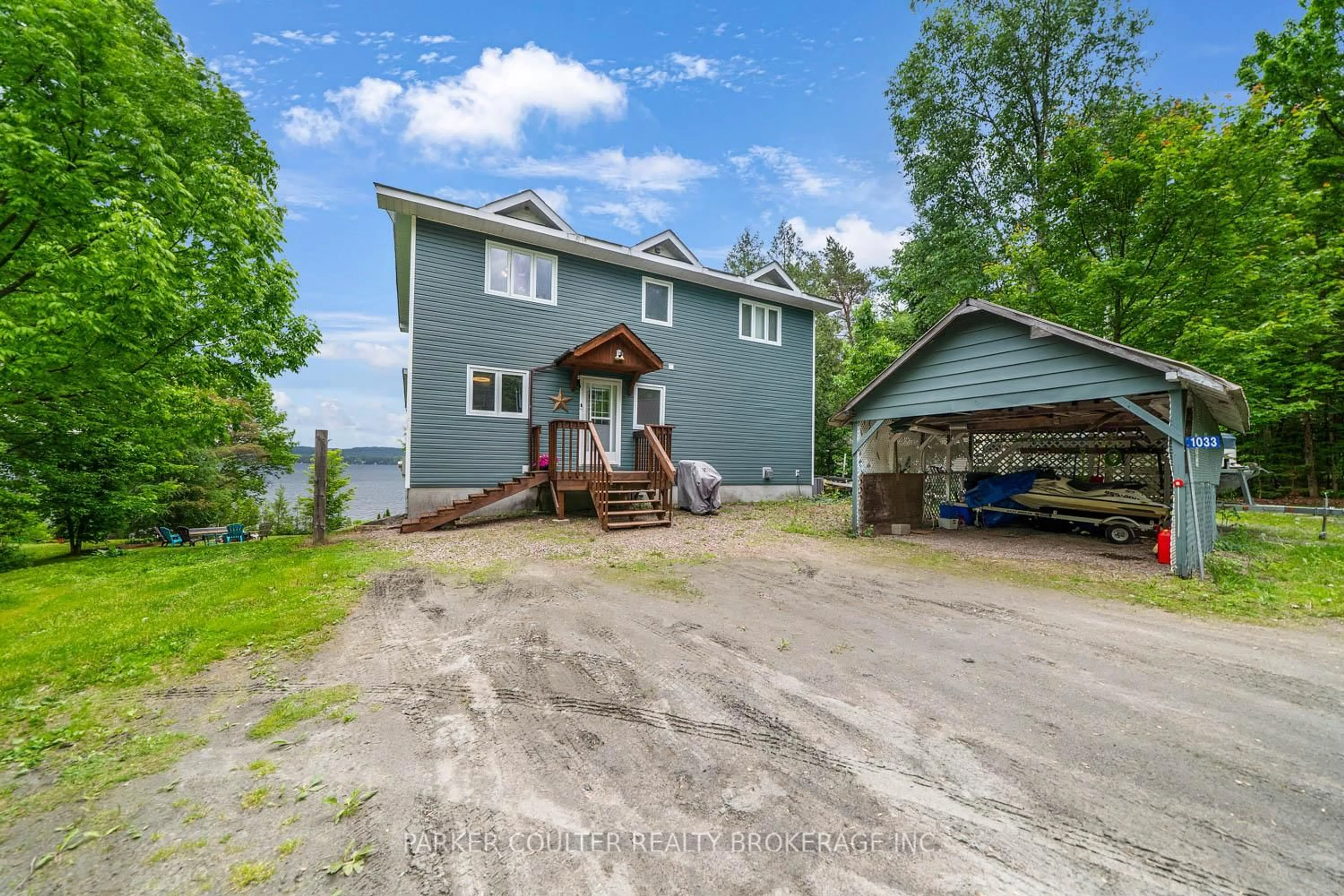 A pic from outside/outdoor area/front of a property/back of a property/a pic from drone, unknown for 1033 Harvest Moon Lane, Algonquin Highlands Ontario K0M 1S0