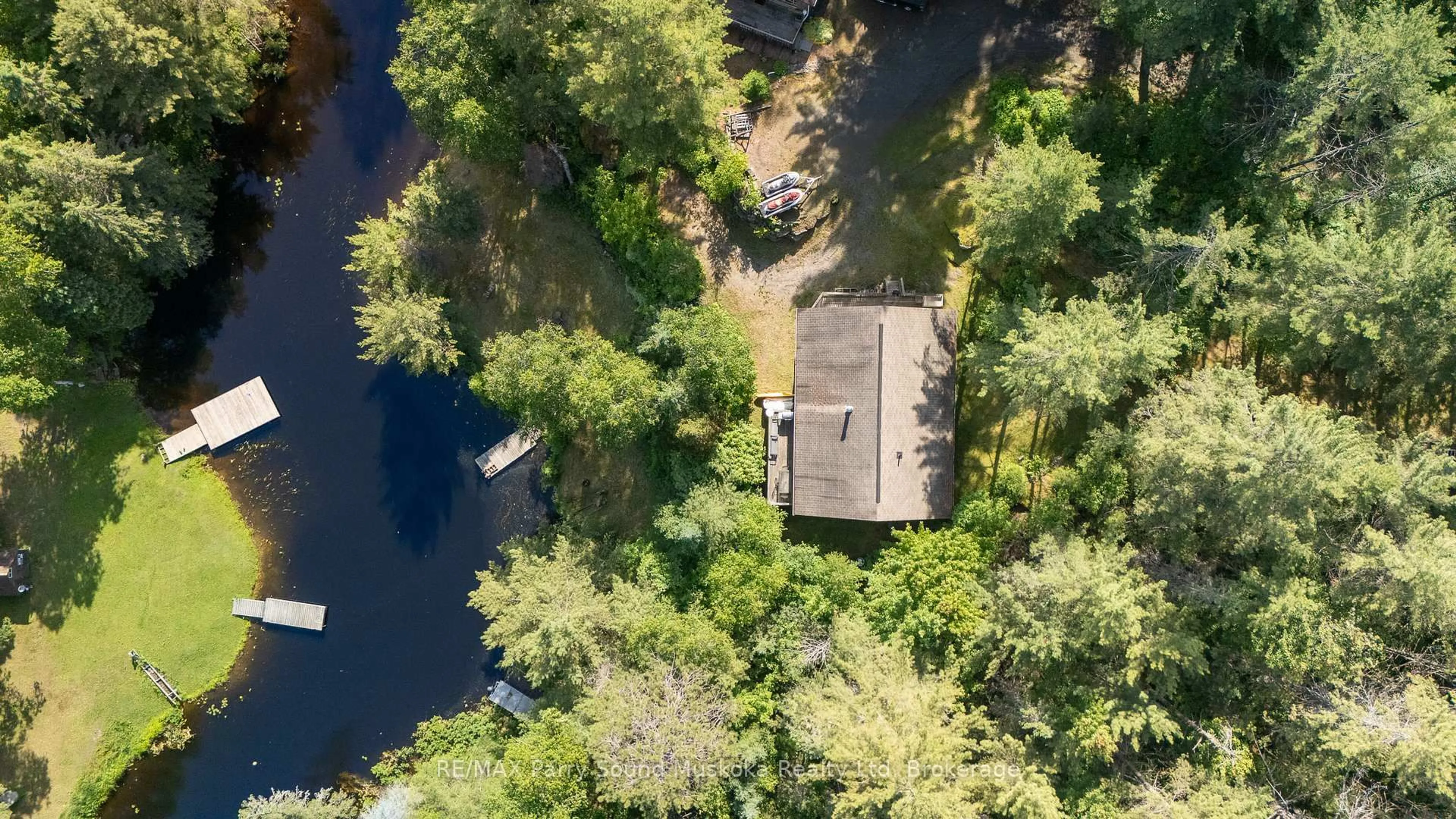 A pic from outside/outdoor area/front of a property/back of a property/a pic from drone, water/lake/river/ocean view for 71A Kawigamog Lake Rd, Parry Sound Remote Area Ontario P0H 1S0