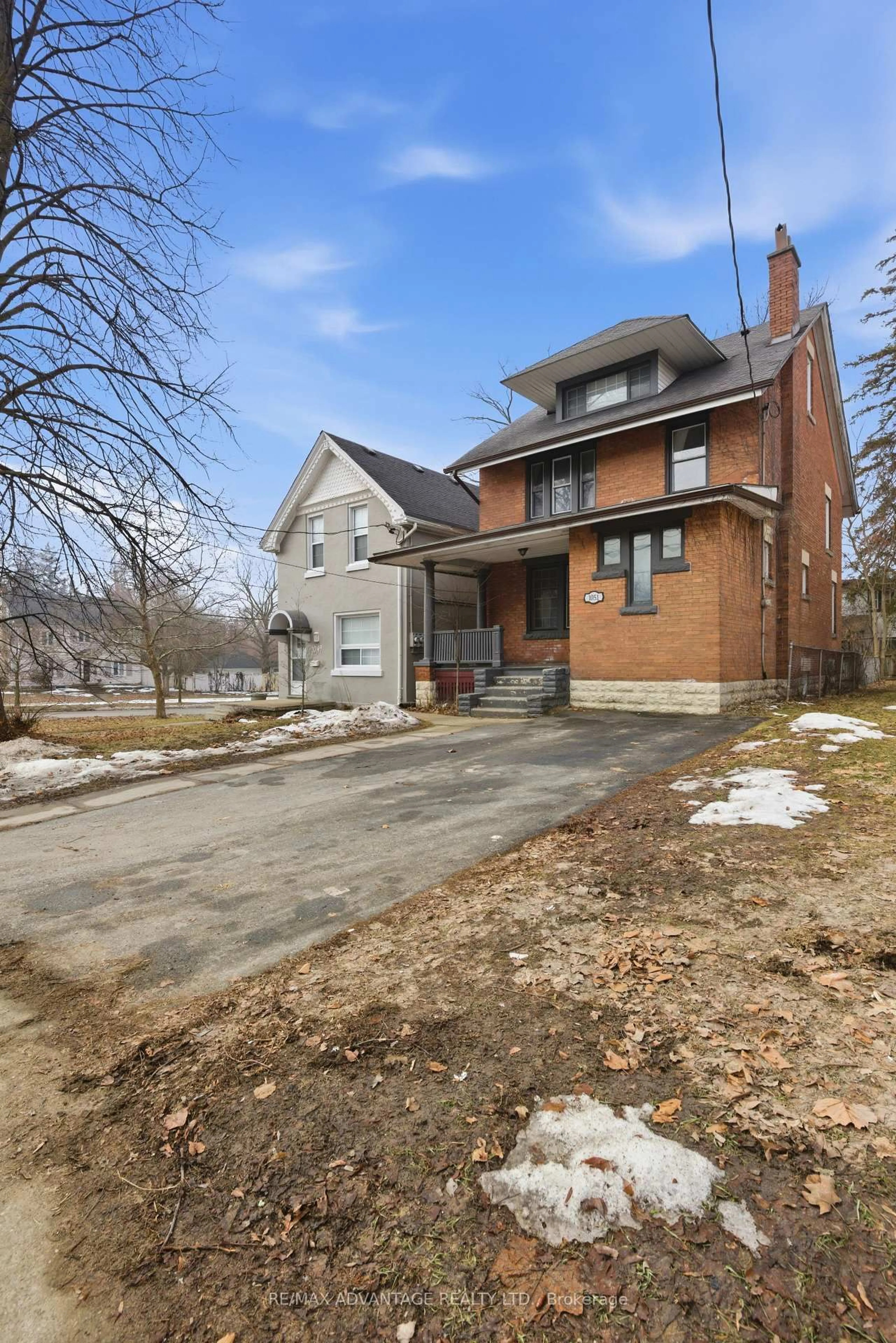 Home with brick exterior material, street for 1051 Richmond St, London East Ontario N6A 3J7