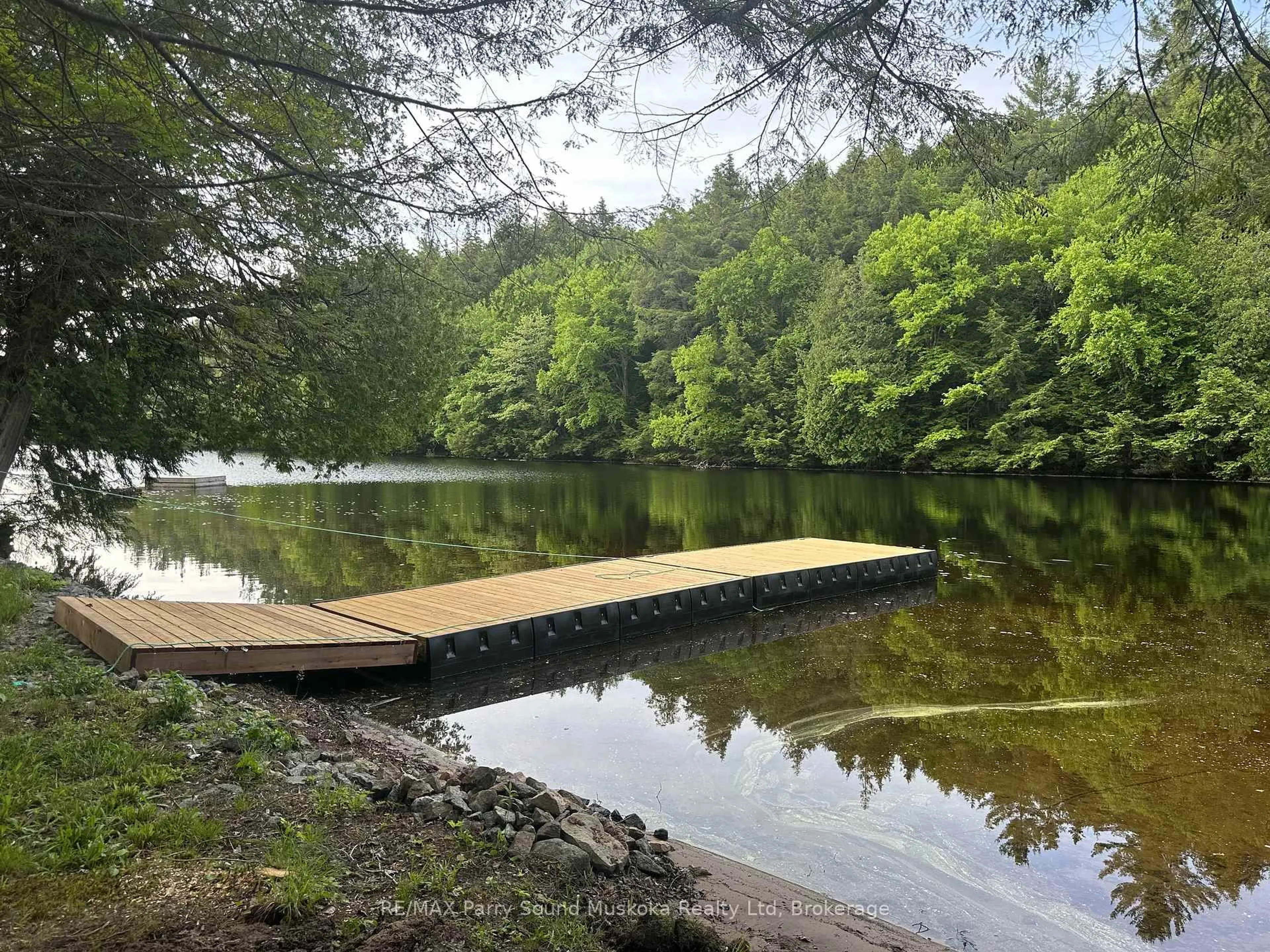 A pic from outside/outdoor area/front of a property/back of a property/a pic from drone, water/lake/river/ocean view for 161 - 25 Balsam Creek Rd, Parry Sound Remote Area Ontario P0H 1S0
