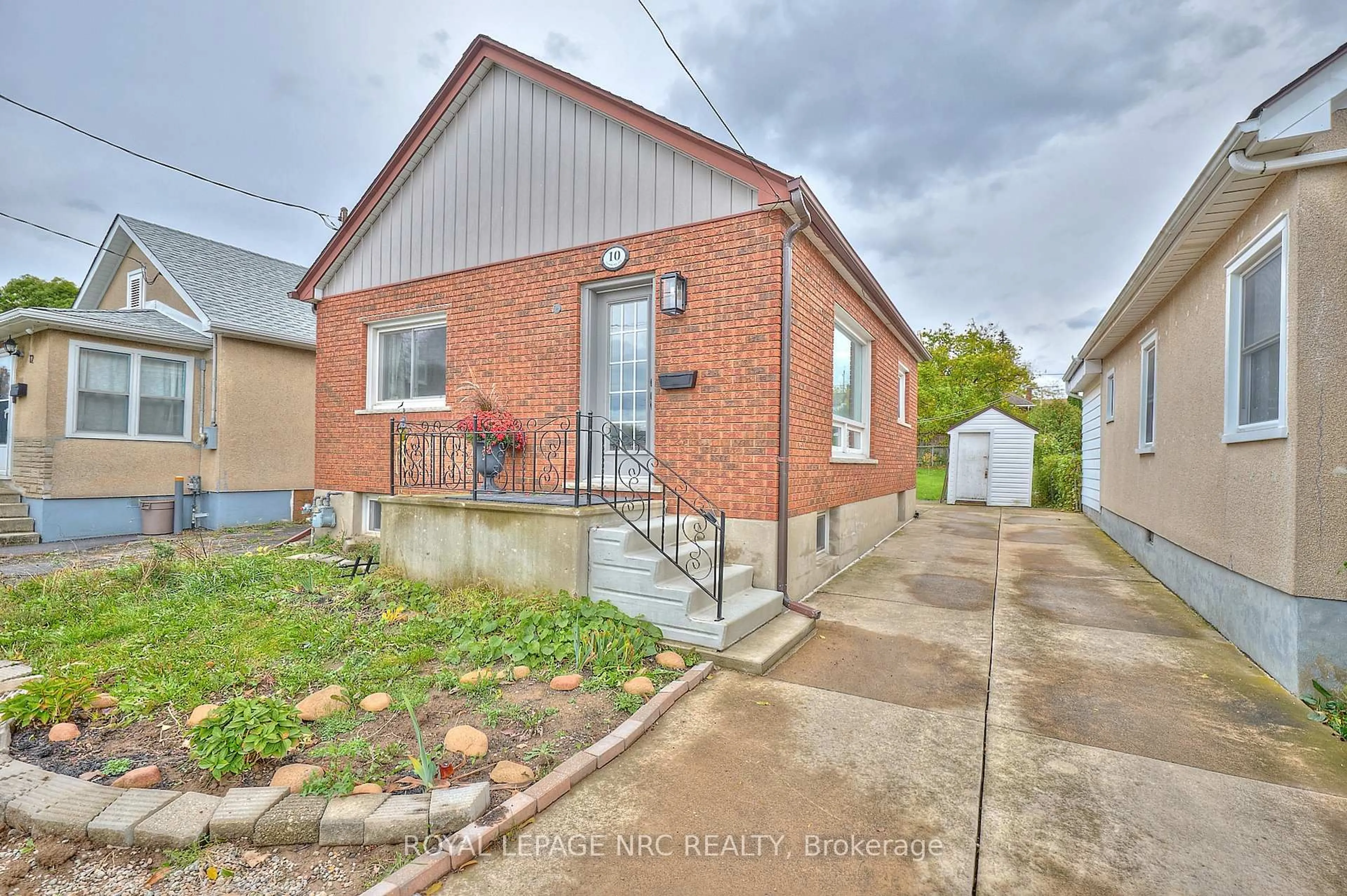 Home with brick exterior material, street for 10 Fairburn Ave, St. Catharines Ontario L2T 1B2