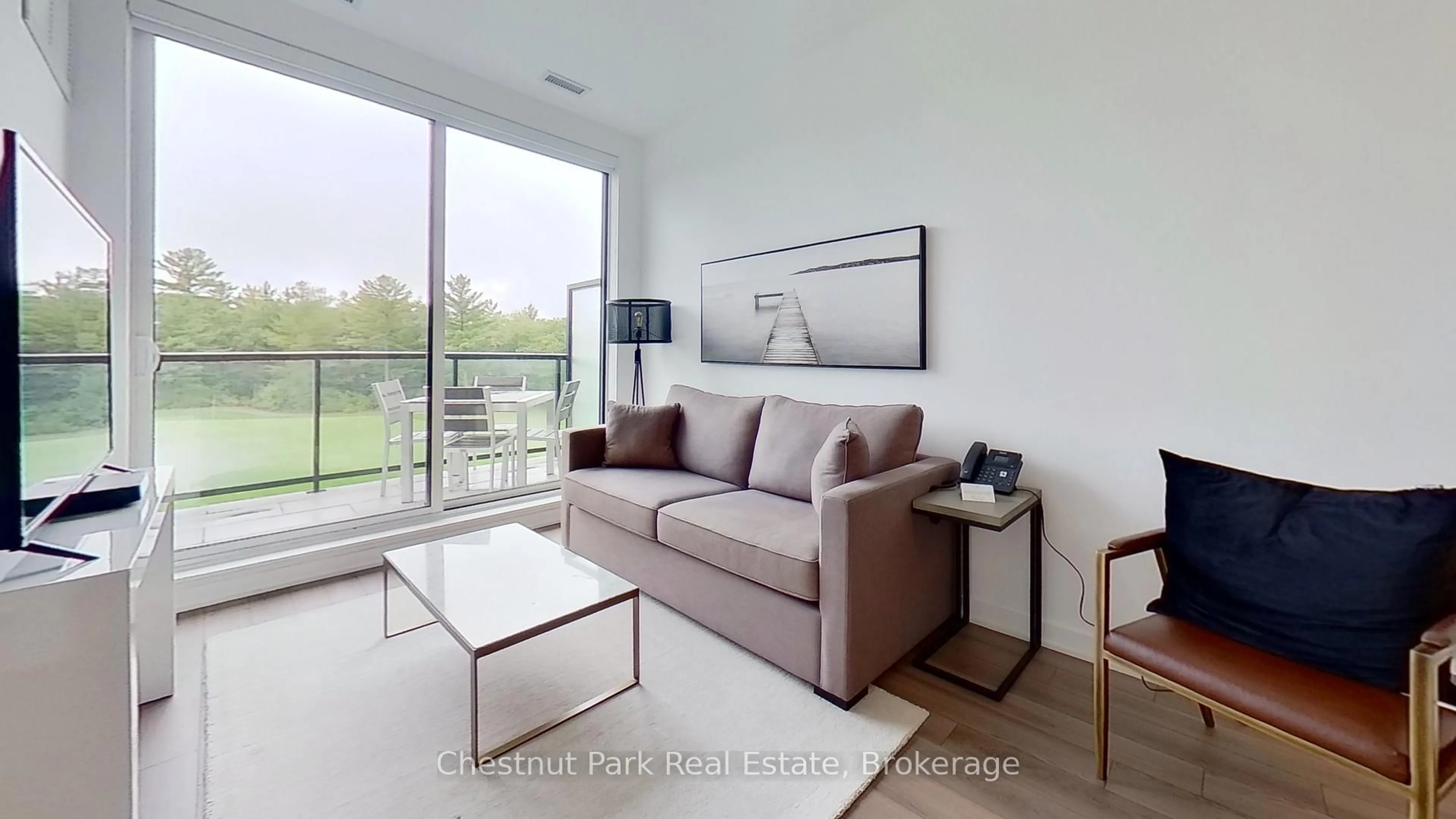 Living room with furniture, unknown for 120 Carrick Tr #410, Gravenhurst Ontario P1P 0B6