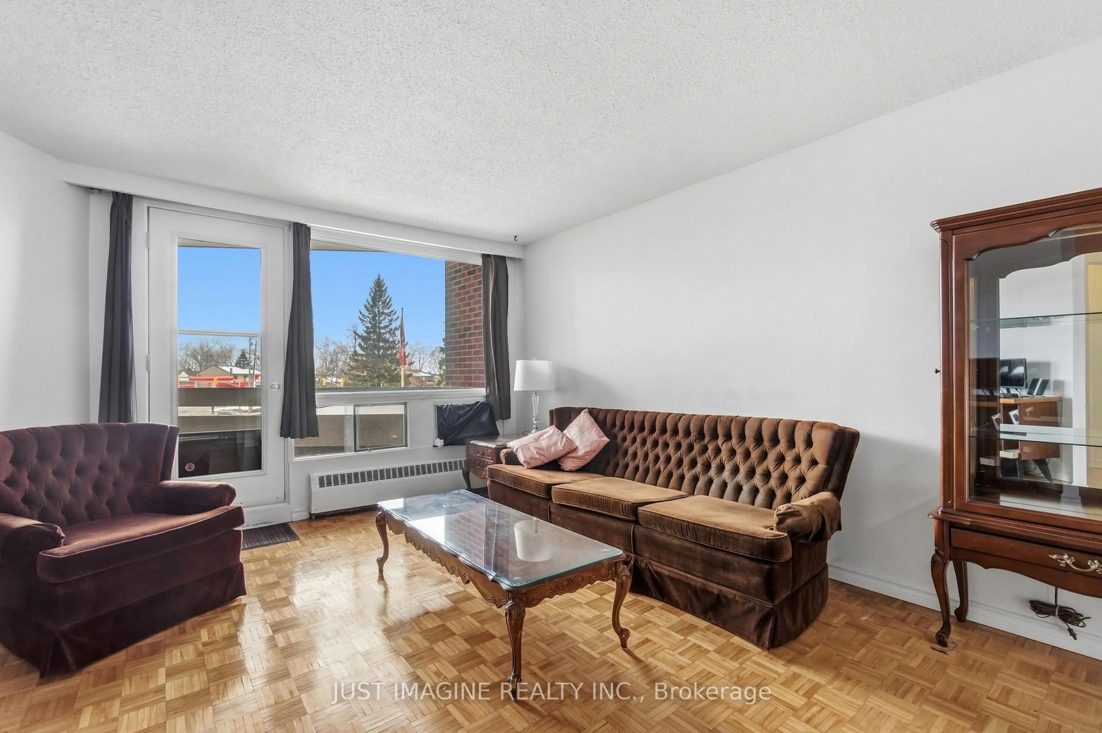 Living room with furniture, unknown for 3100 Carling Ave #201, Ottawa Ontario K2B 6J6