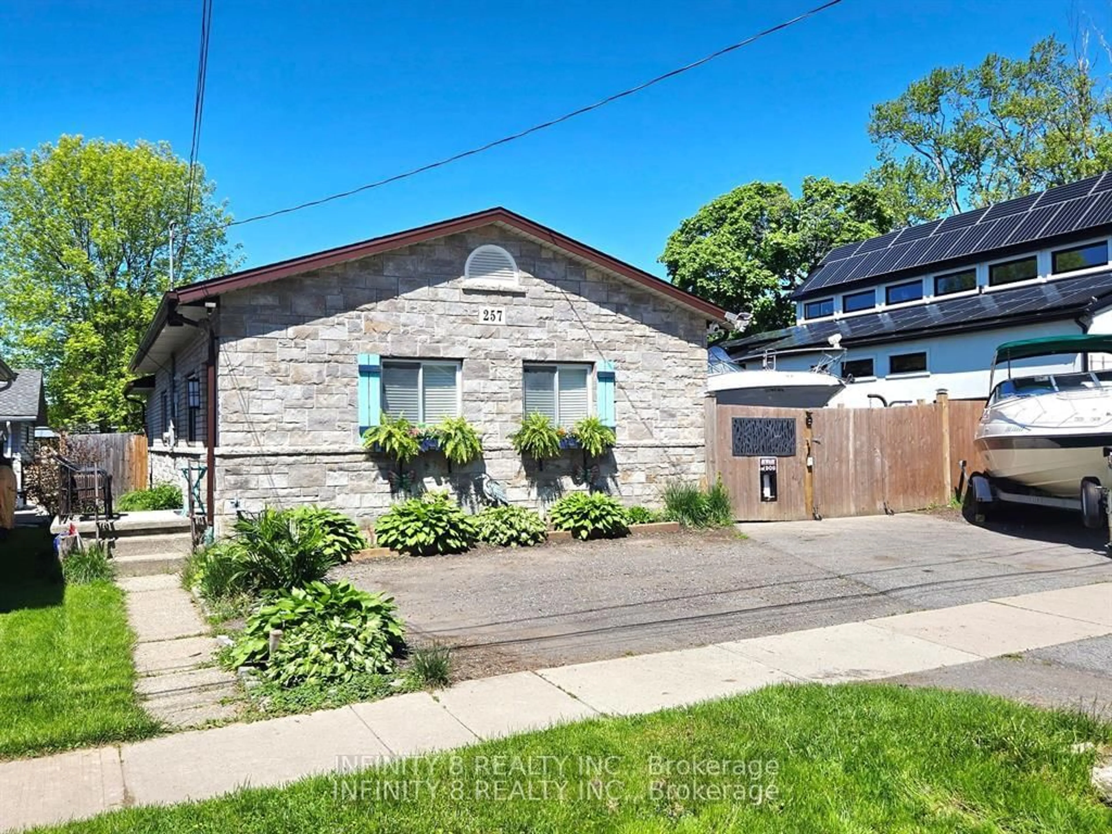 Home with brick exterior material, street for 257 Ridge Road S Rd, Fort Erie Ontario L0S 1B0
