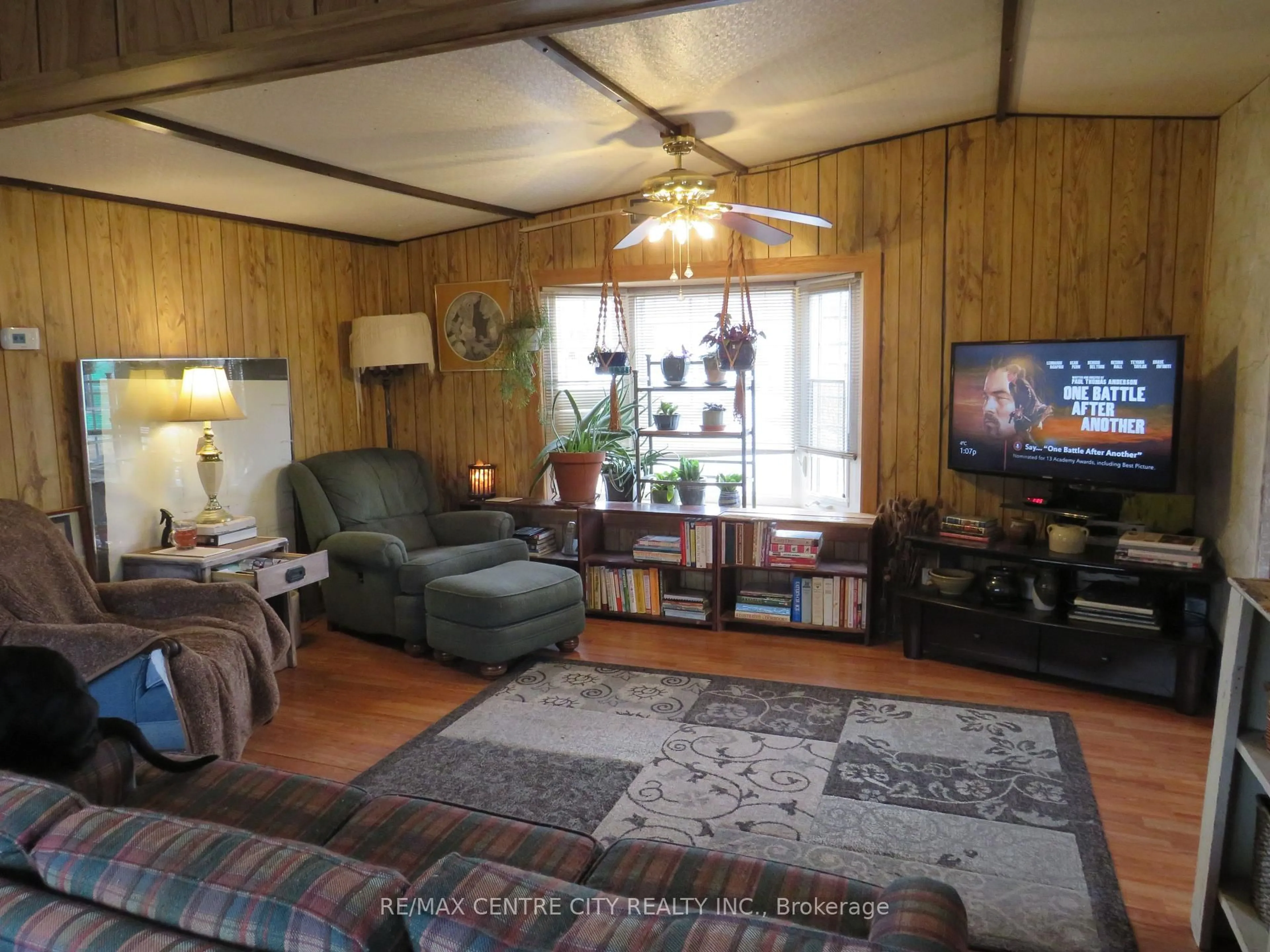 Living room with furniture, wood/laminate floor for 198 Springbank Dr #5, London South Ontario N6J 1G1