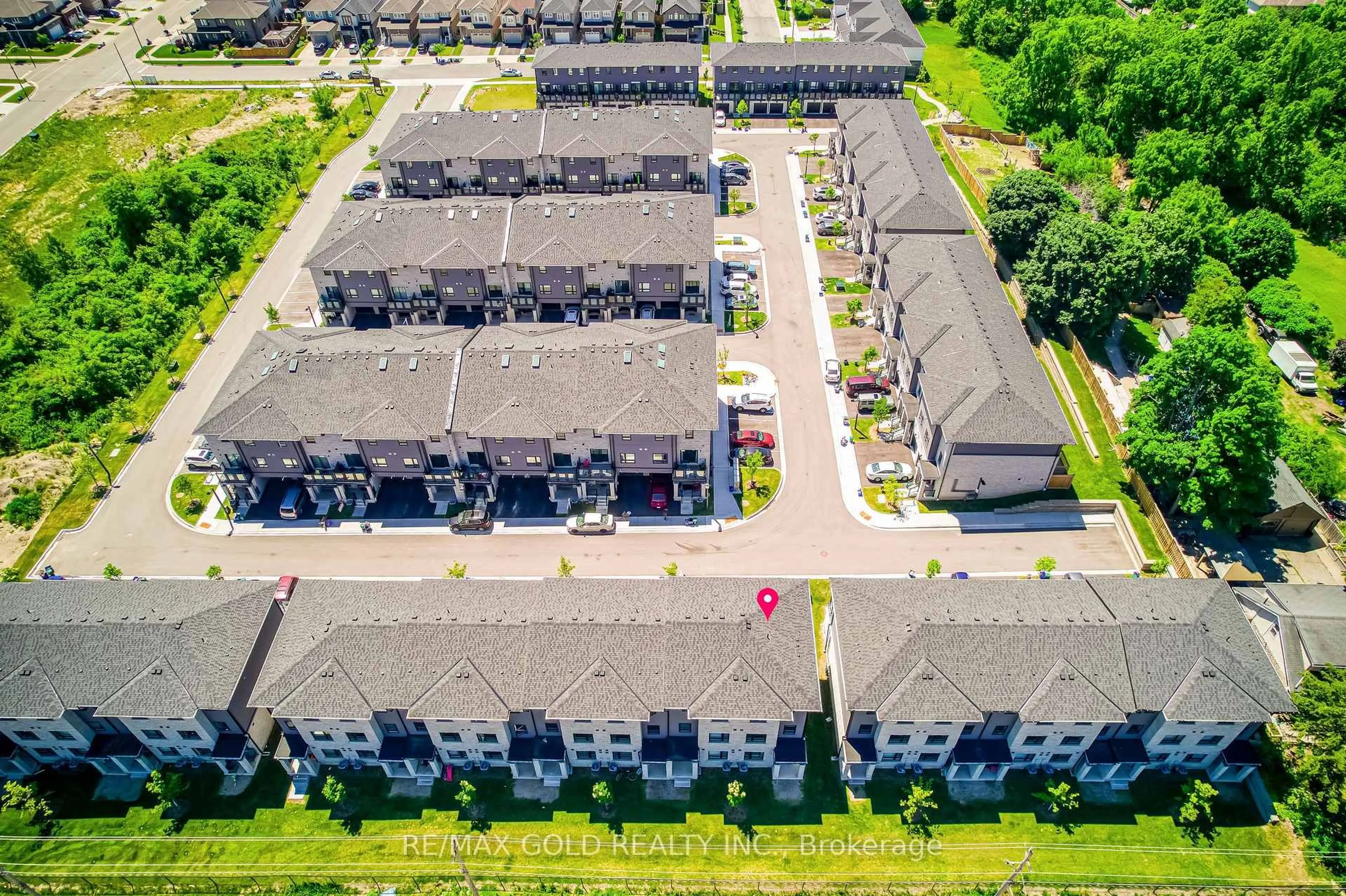 A pic from outside/outdoor area/front of a property/back of a property/a pic from drone, unknown for 51 Sparrow Ave #90, Cambridge Ontario N1T 0E5