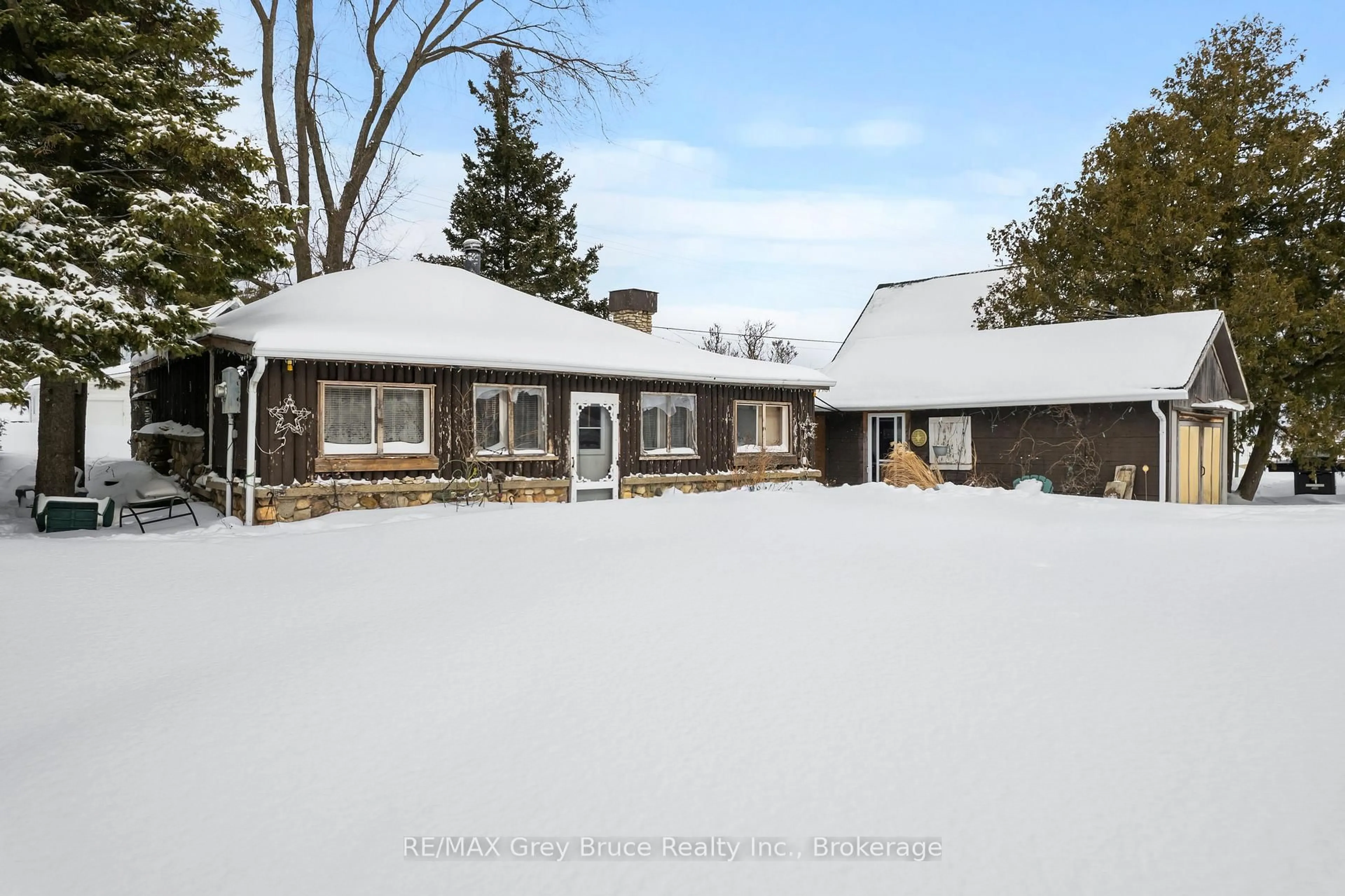 A pic from outside/outdoor area/front of a property/back of a property/a pic from drone, street for 11 McNeil St, Northern Bruce Peninsula Ontario N0H 1W0