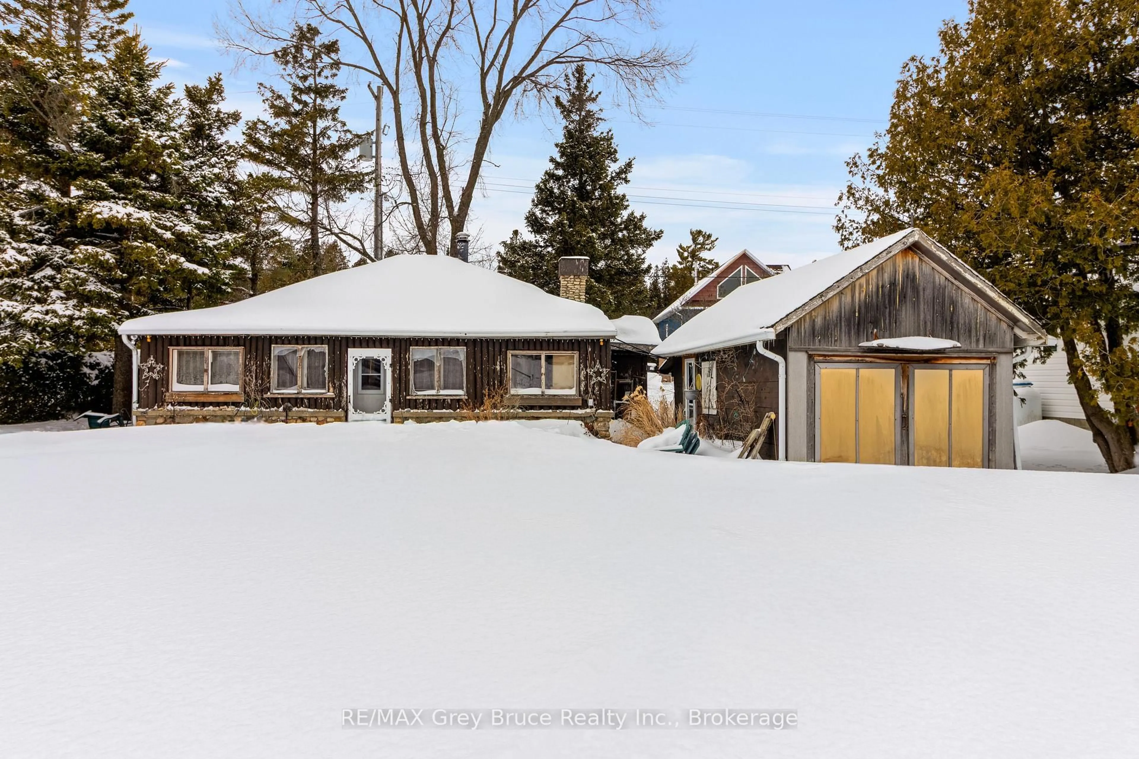A pic from outside/outdoor area/front of a property/back of a property/a pic from drone, street for 11 McNeil St, Northern Bruce Peninsula Ontario N0H 1W0
