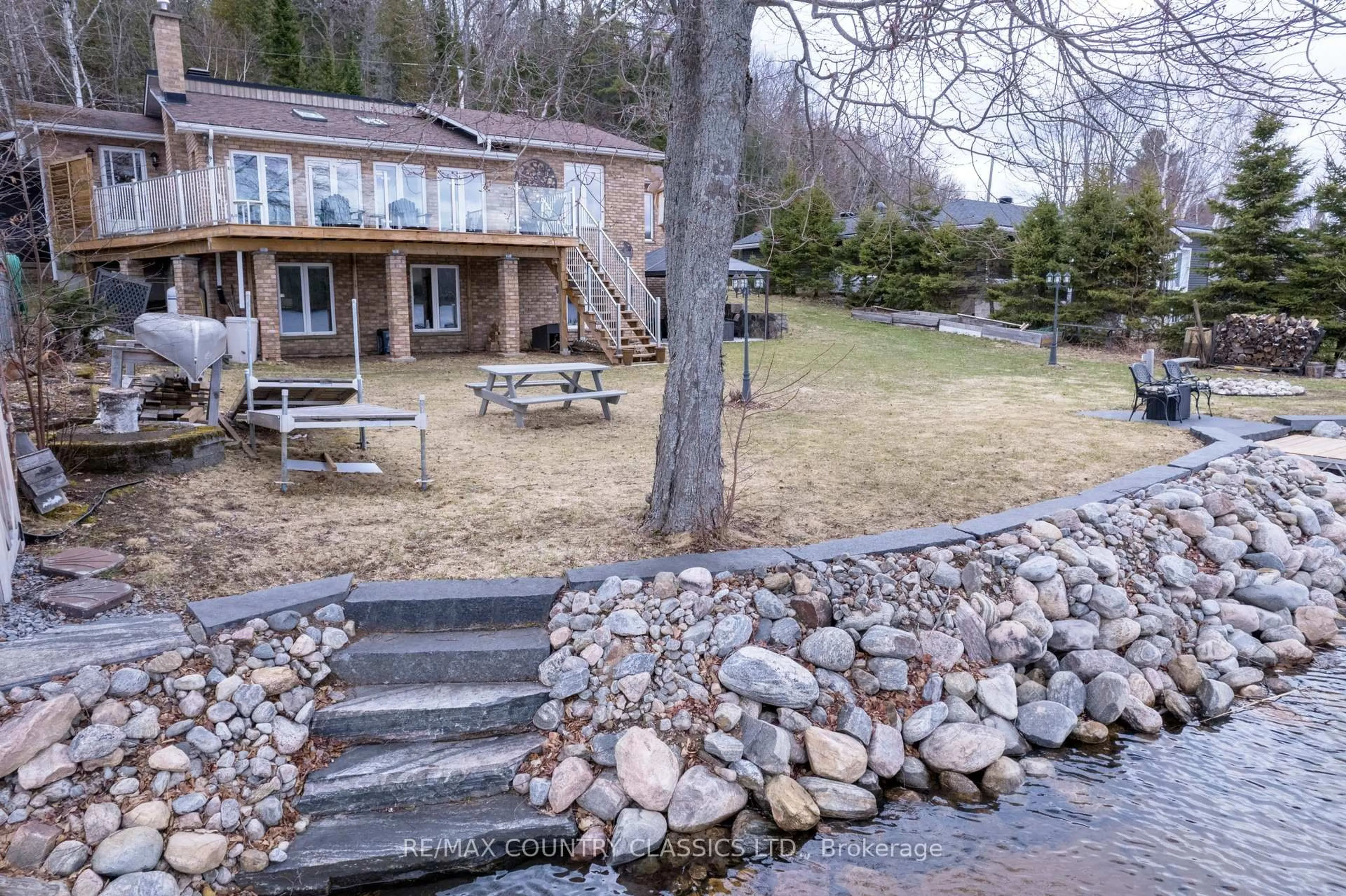 A pic from outside/outdoor area/front of a property/back of a property/a pic from drone, water/lake/river/ocean view for 1787 North Baptiste Lake Rd, Maynooth Ontario K0L 2S0