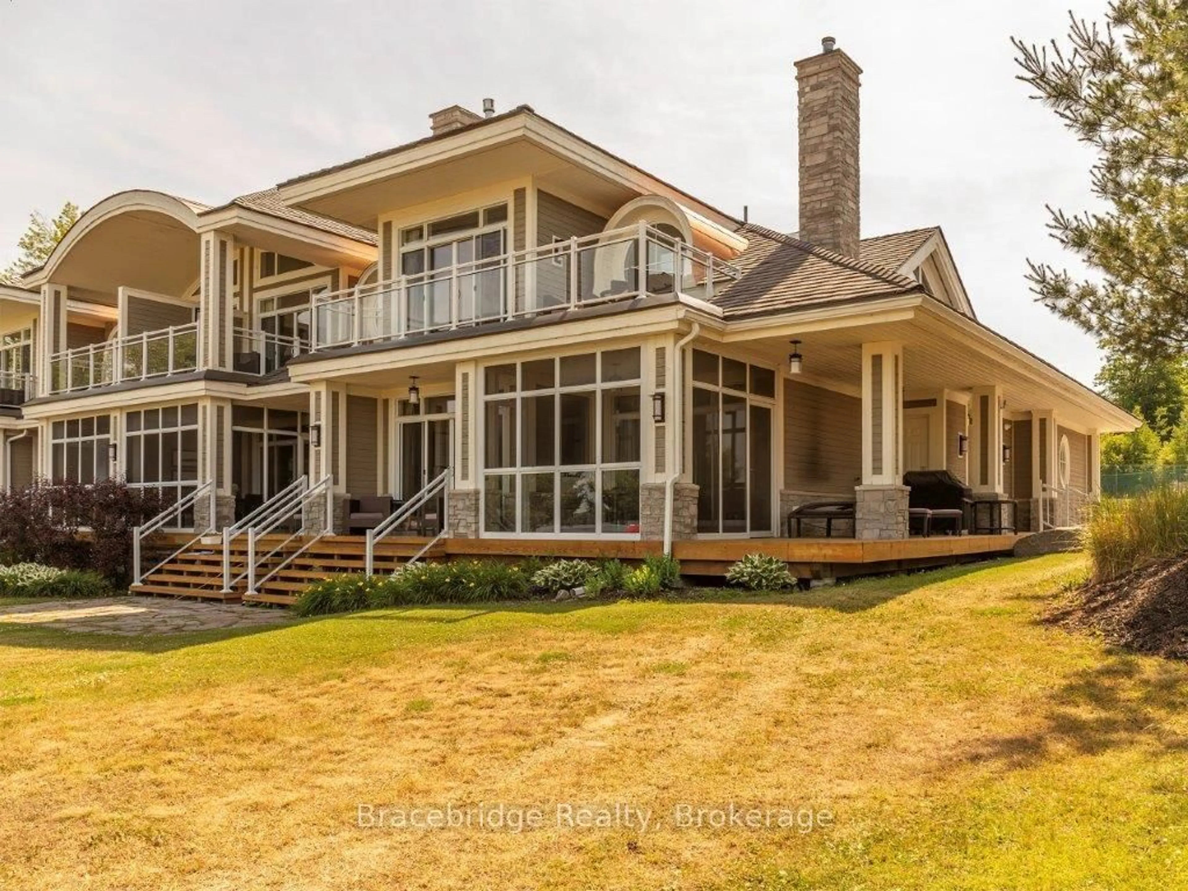 Home with brick exterior material, water/lake/river/ocean view for 1869 Muskoka Road 118 Highway #G104-D2, Muskoka Lakes Ontario P1L 1W8