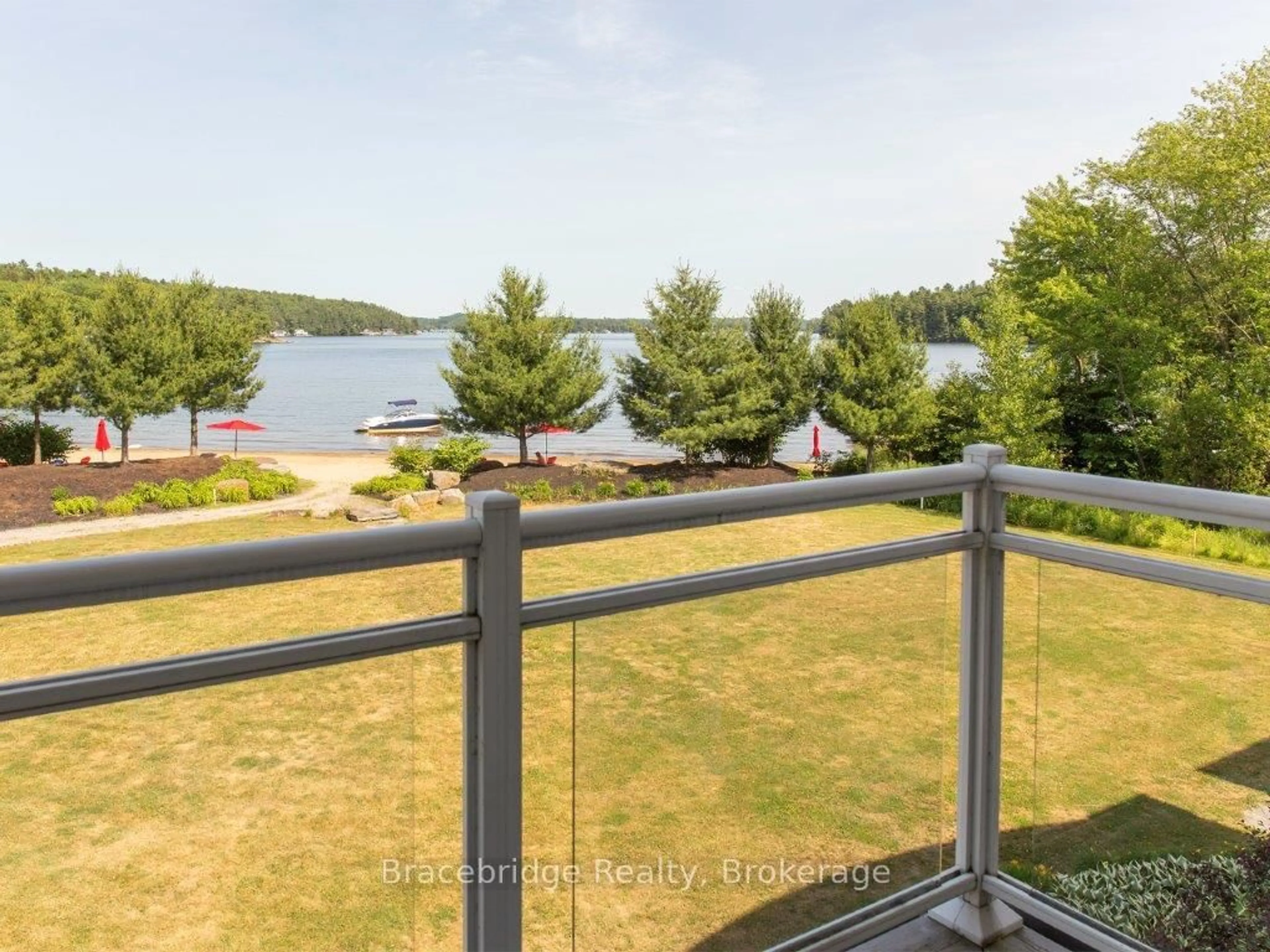 Patio, water/lake/river/ocean view for 1869 Muskoka Road 118 Highway #G104-D2, Muskoka Lakes Ontario P1L 1W8