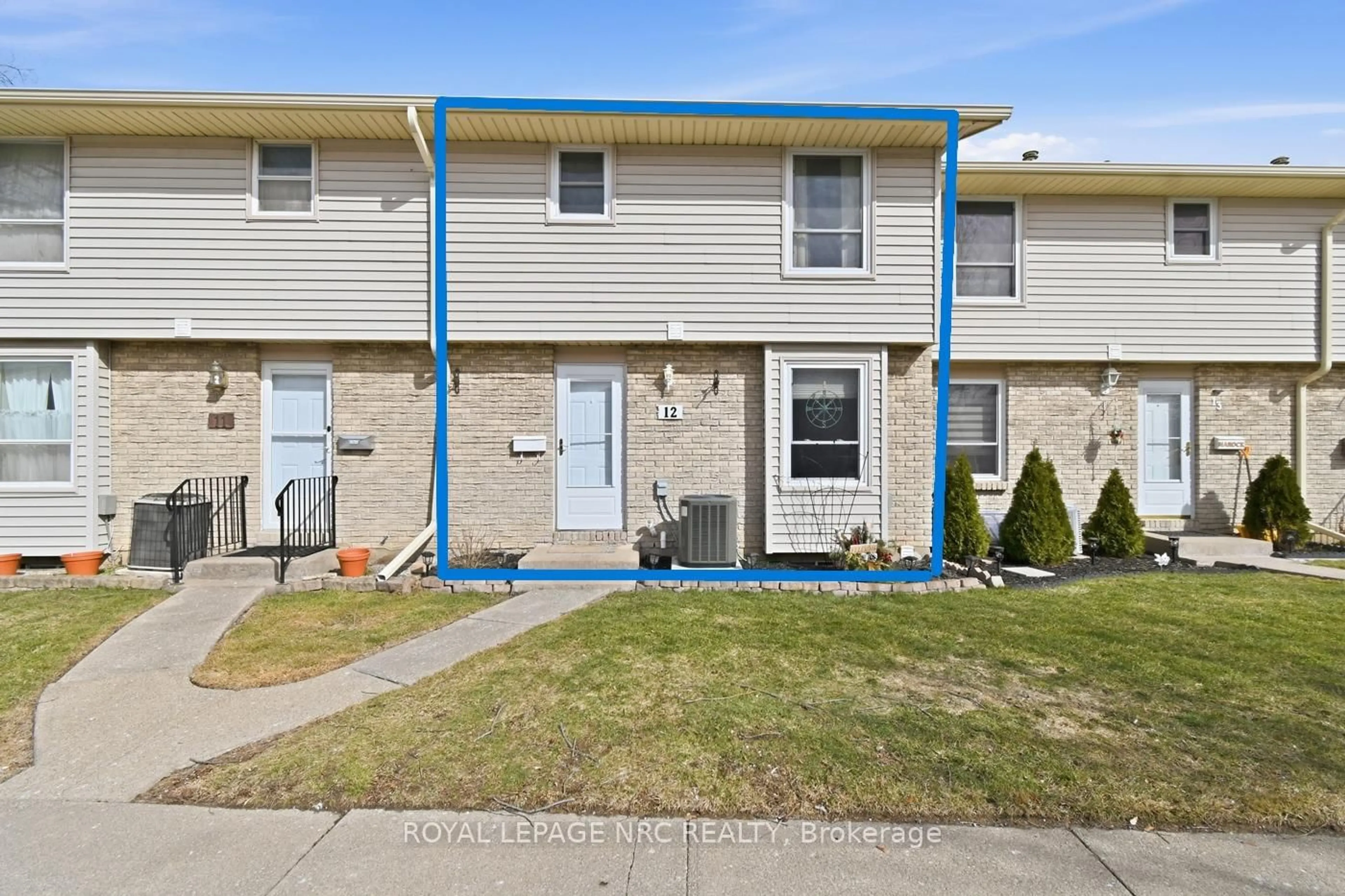 Home with vinyl exterior material, street for 242 Lakeport Dr #12, St. Catharines Ontario L2N 6V2